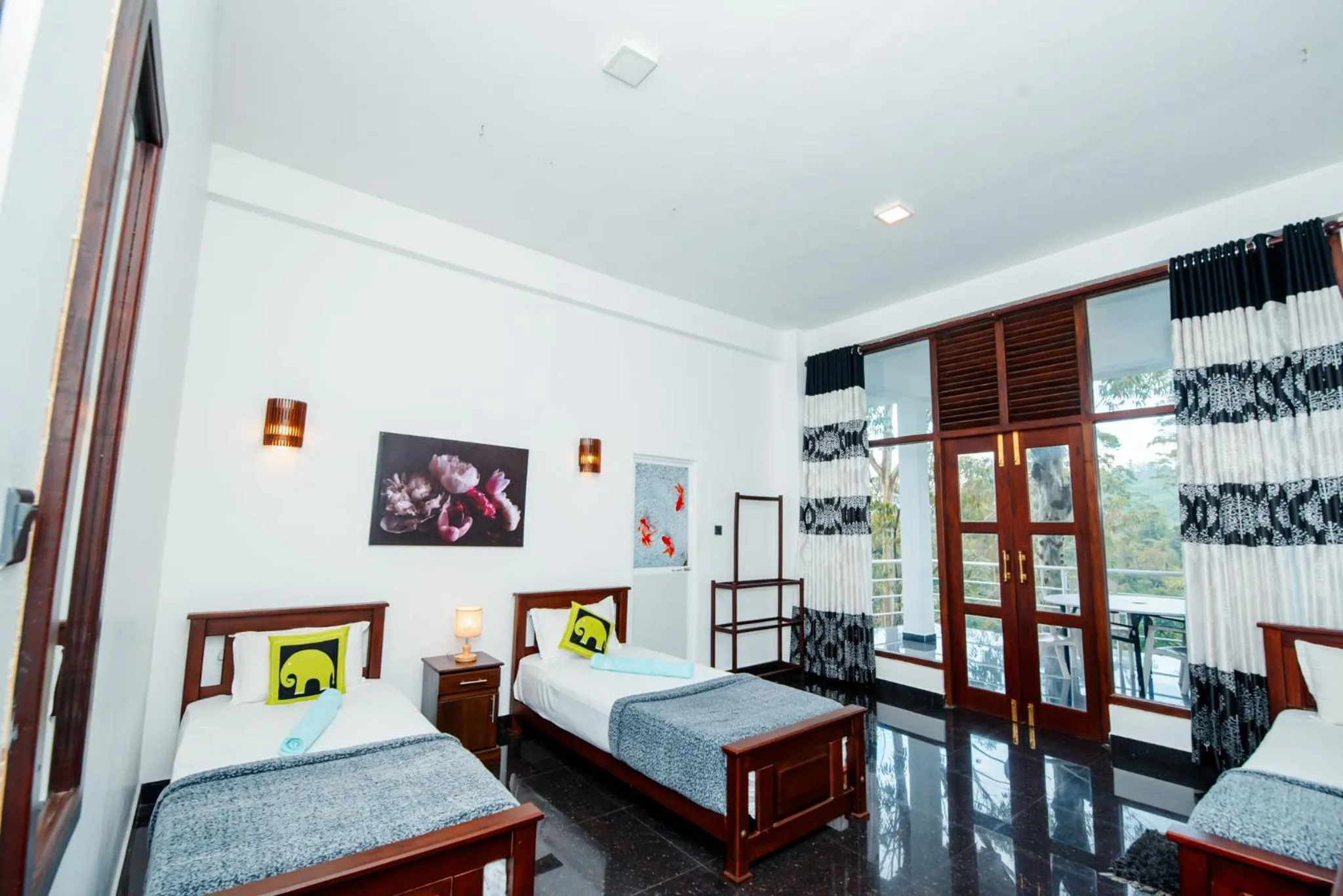 Bed in Adams Peak Inn