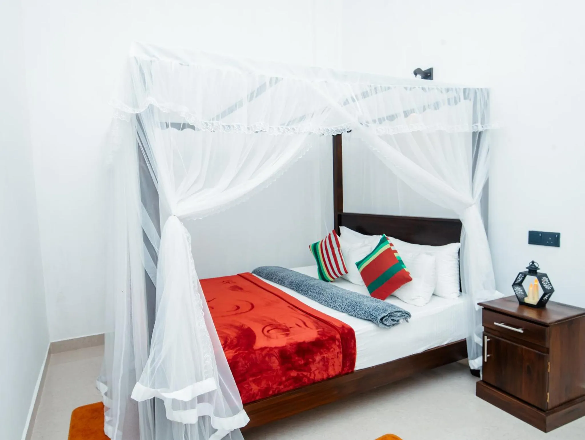 Bed in Adams Peak Inn