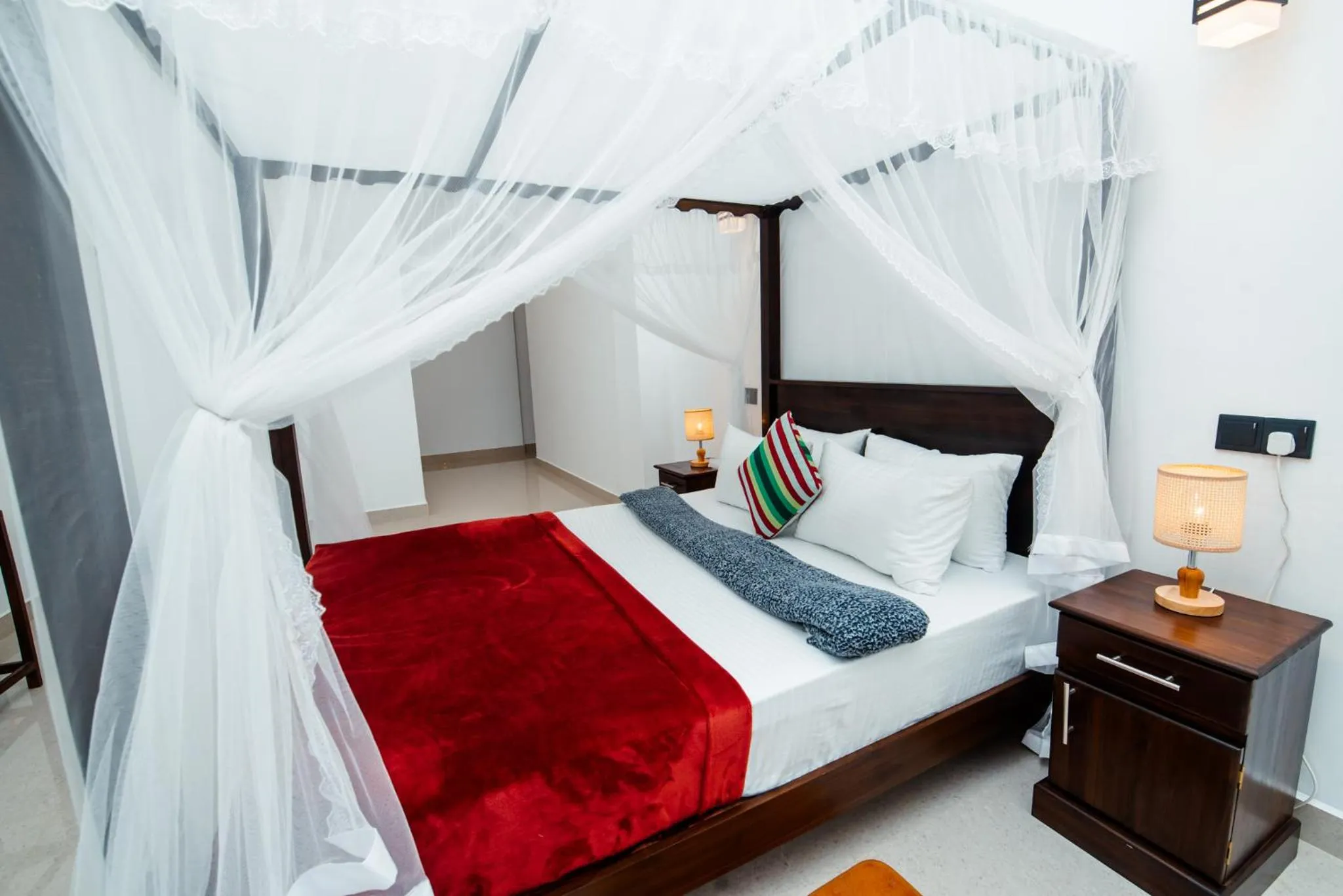 Bed in Adams Peak Inn