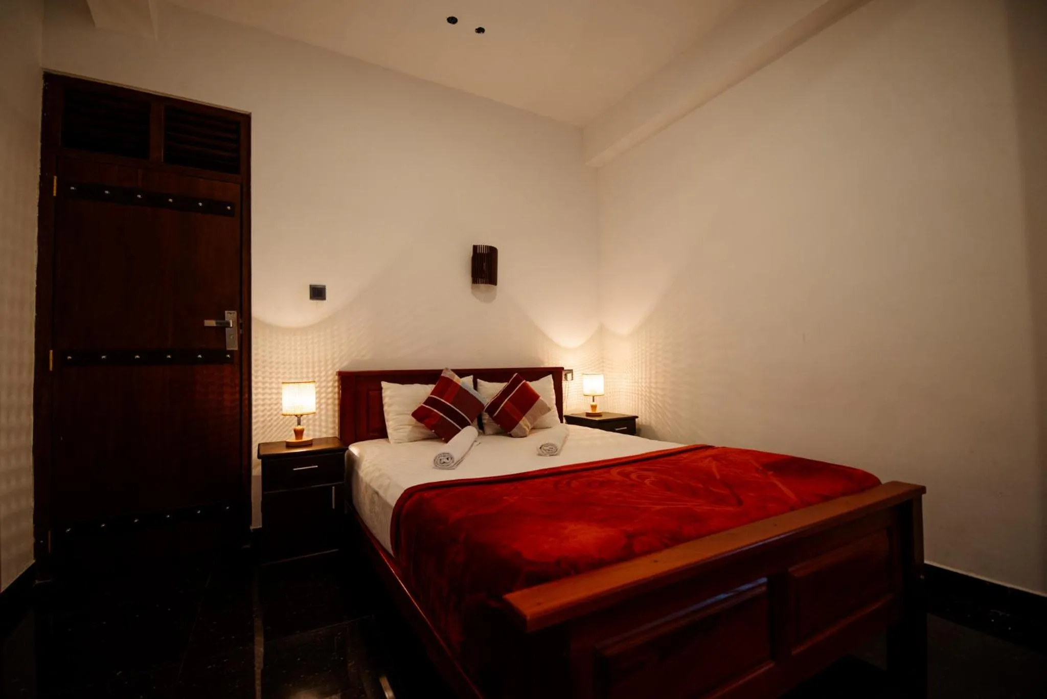 Bed in Adams Peak Inn