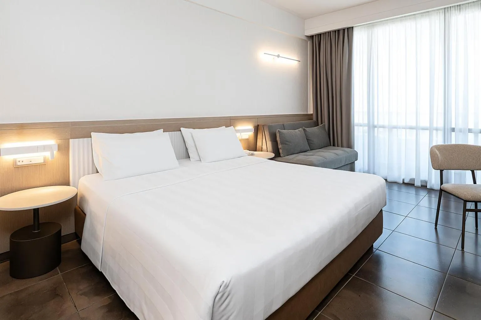 Photo of the whole room, Bed in Thalassa Beach Resort & Spa (Adults Only)