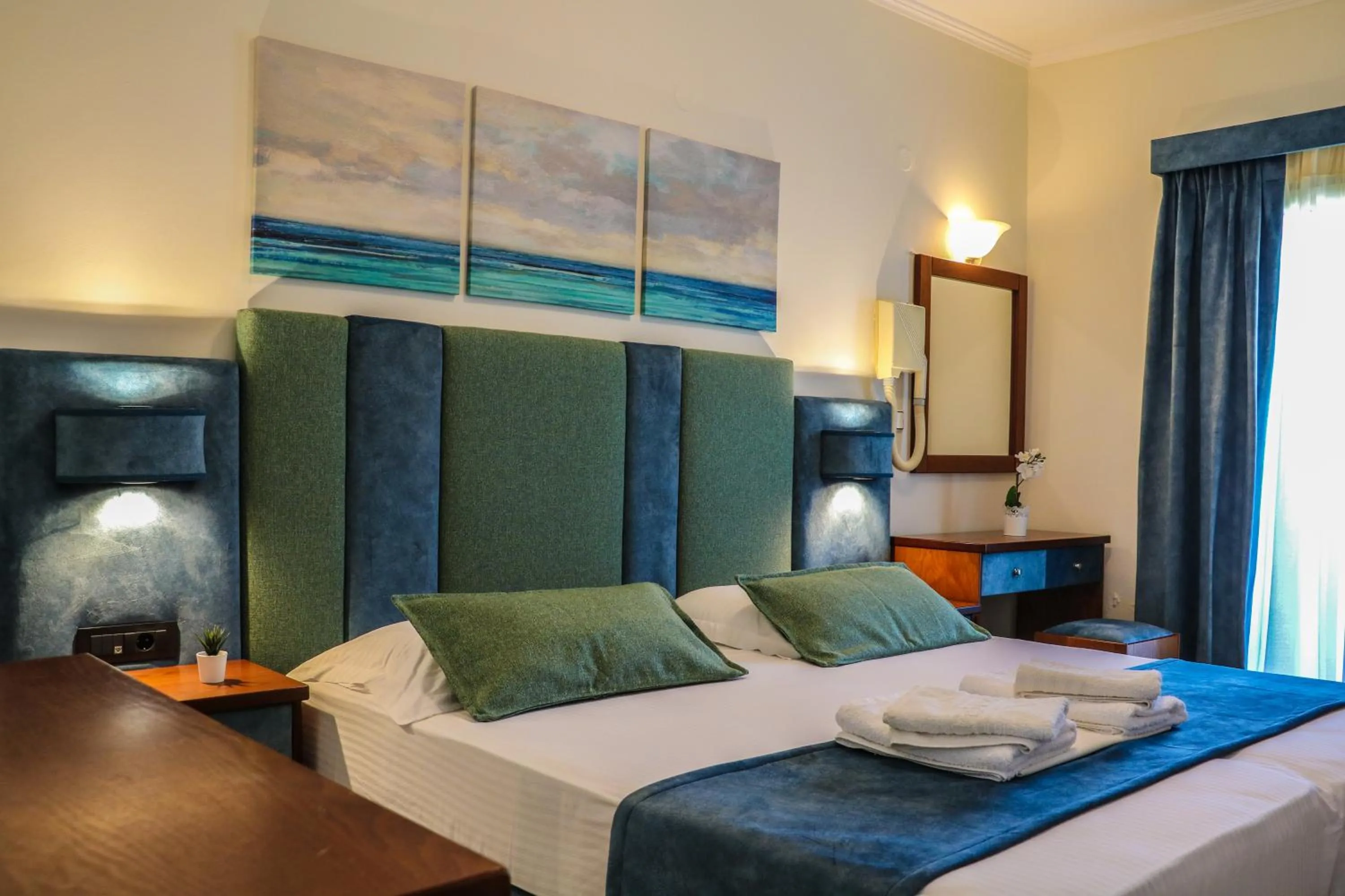 Bed in Hotel Dionysis Studios