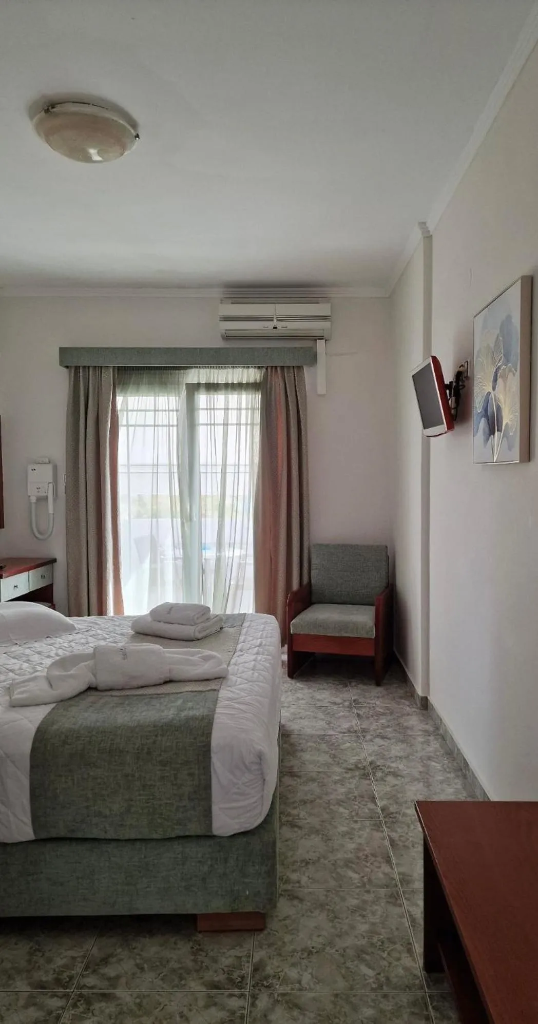 Bed in Hotel Dionysis Studios