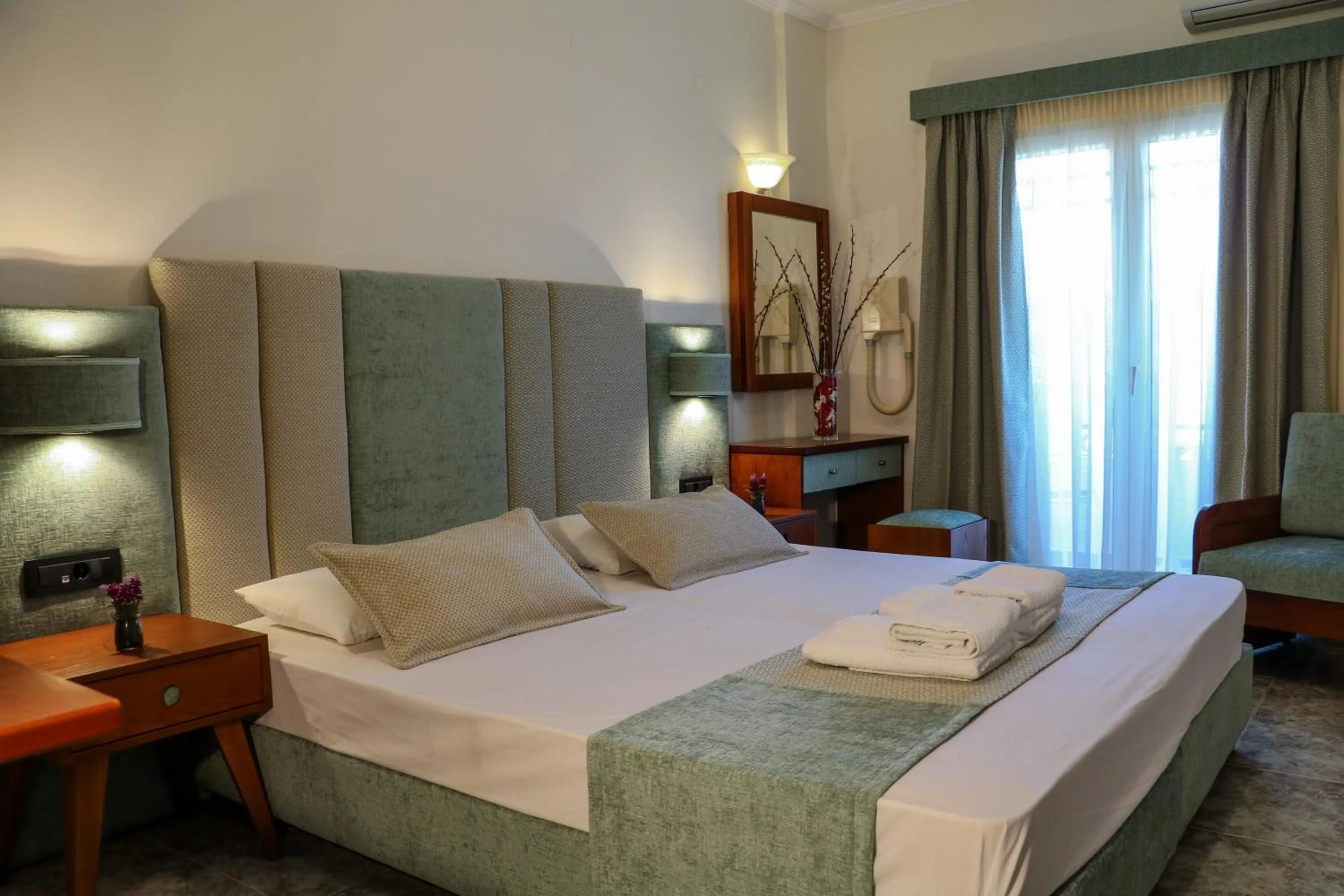 Bed in Hotel Dionysis Studios