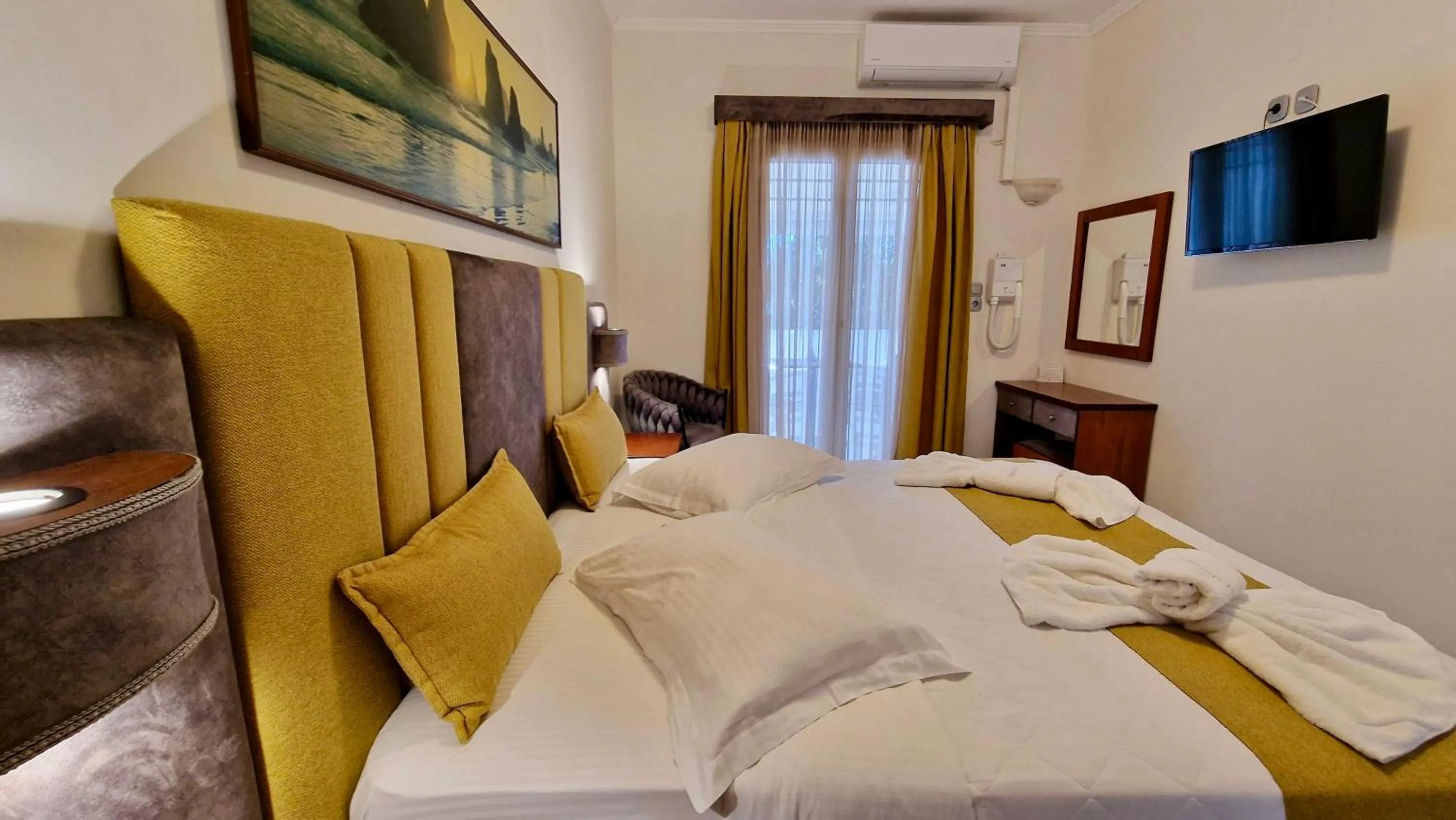 Bed in Hotel Dionysis Studios