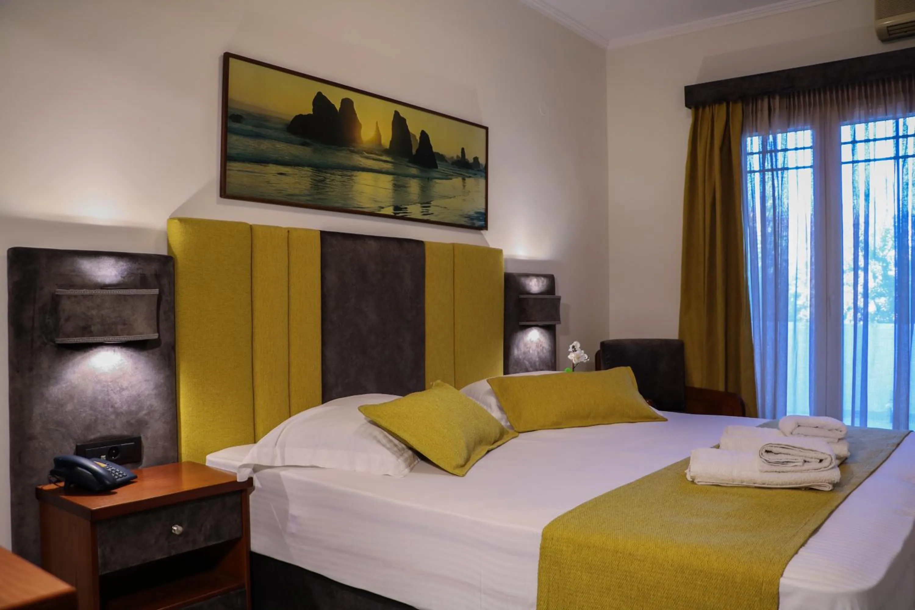 Bed in Hotel Dionysis Studios