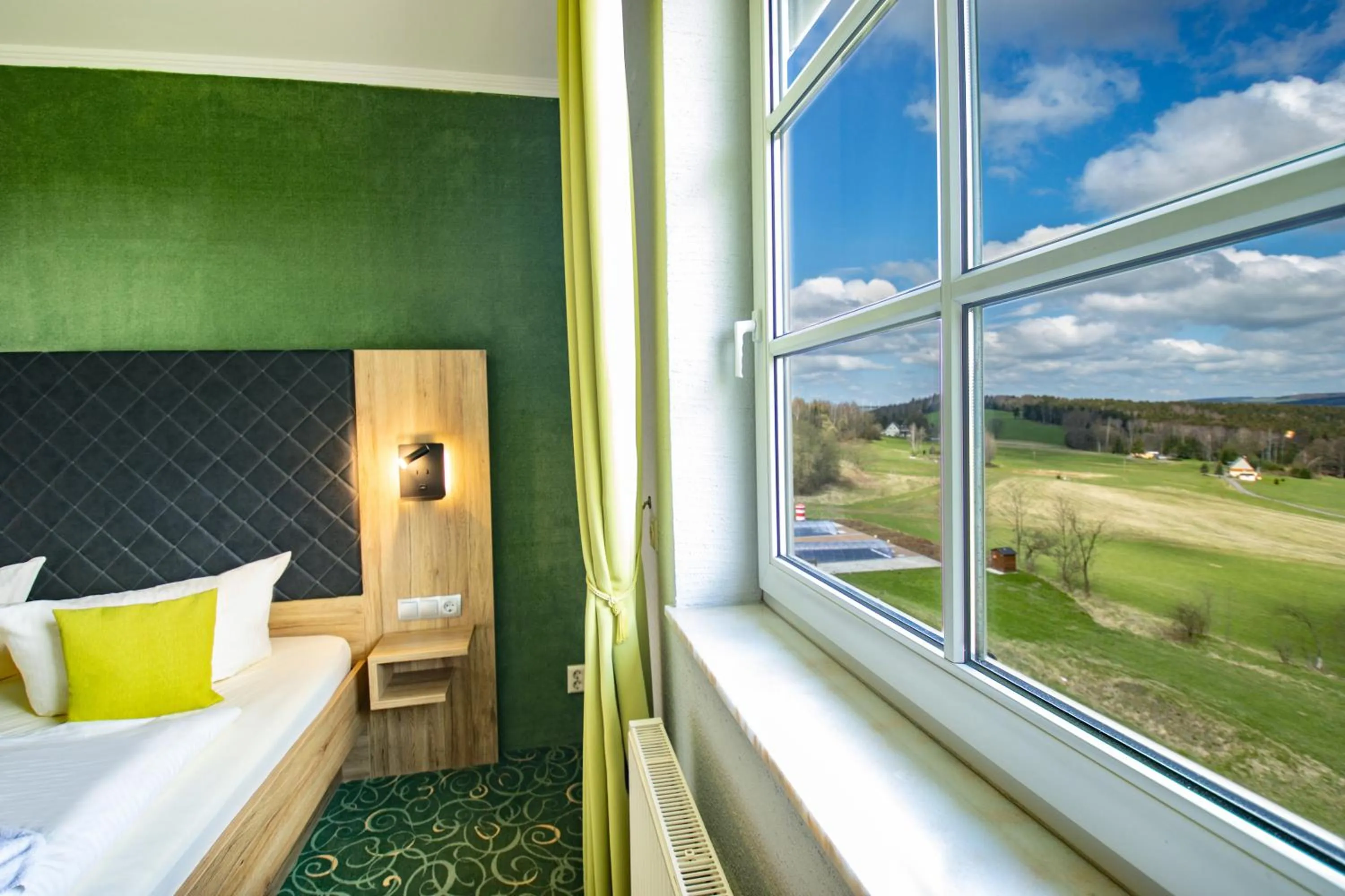 View (from property/room), Bed in Panorama Berghotel Wettiner Höhe