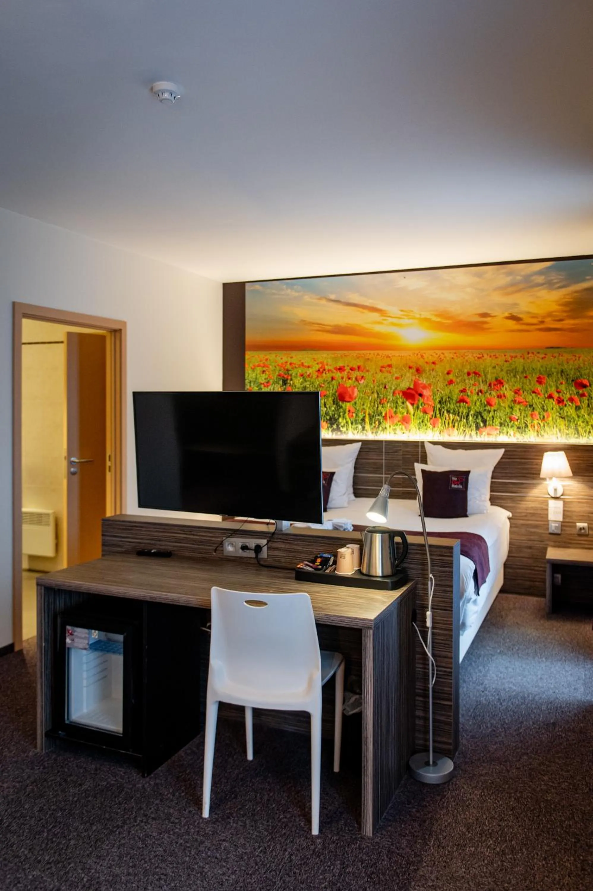 Communal lounge/ TV room in Hotel-Restaurant Horizon Ath-Lessines