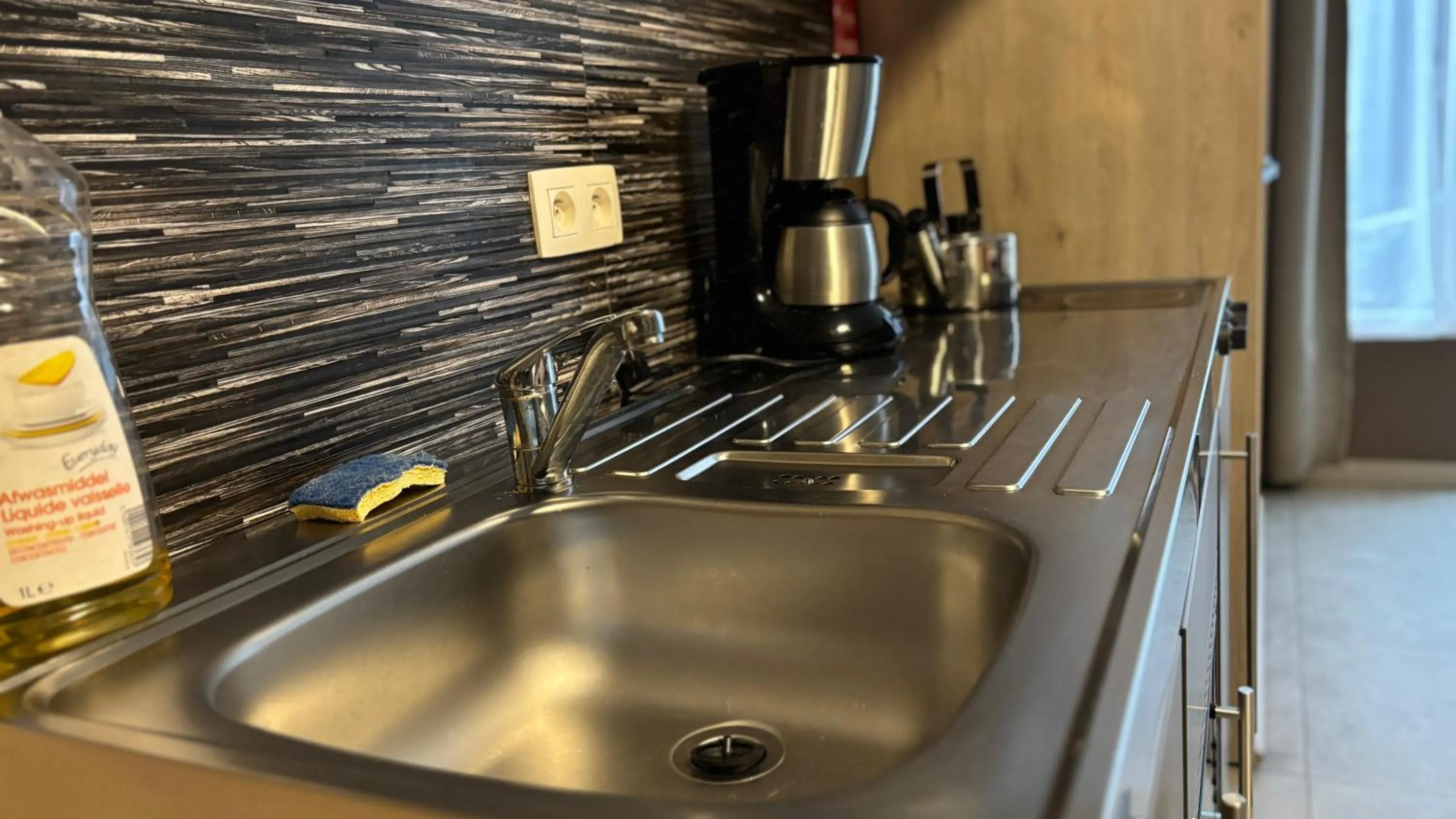 Kitchen or kitchenette in Hotel La Louve