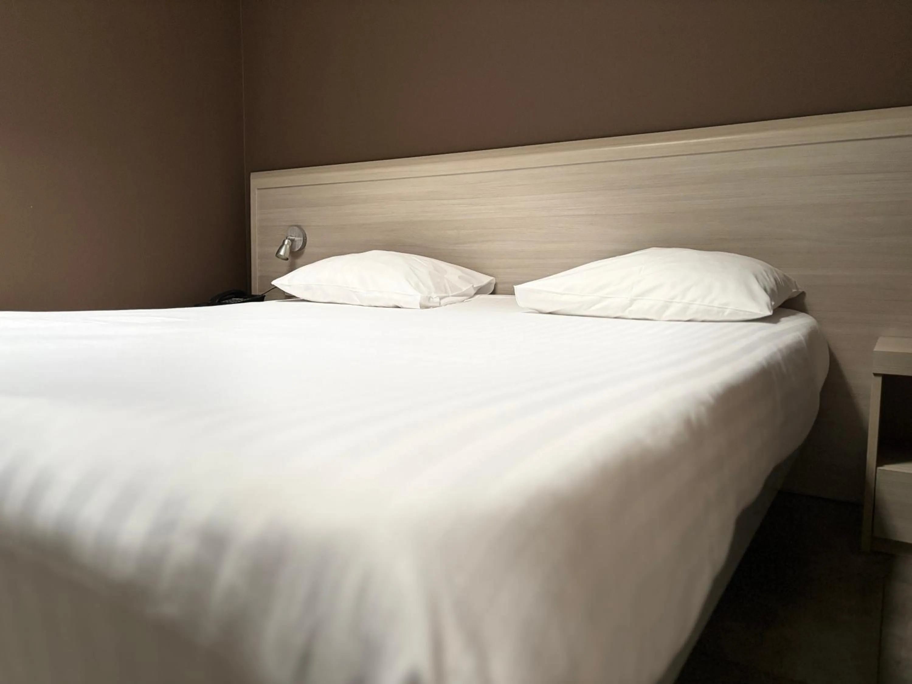 Bed in Hotel La Louve