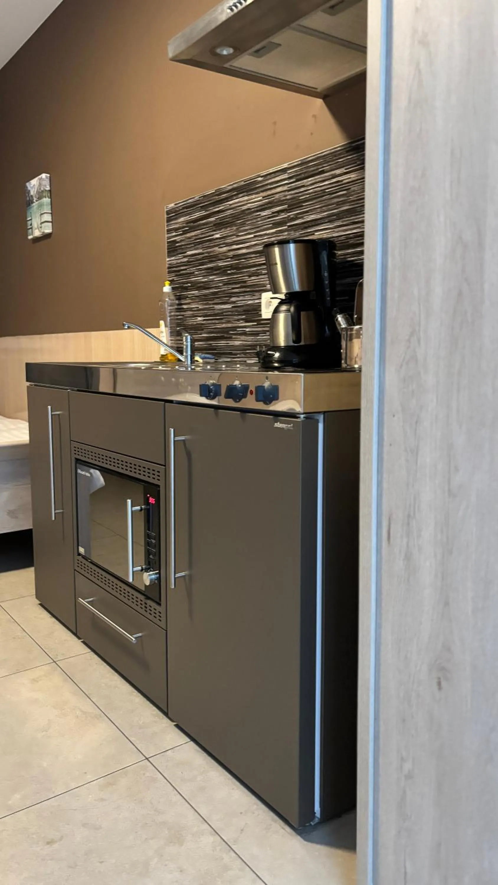 Kitchen or kitchenette in Hotel La Louve