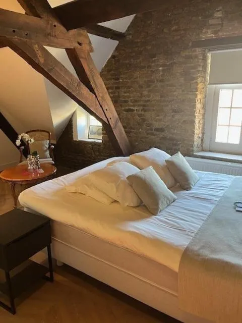 Bed in Amaryllis Hotel Veurne