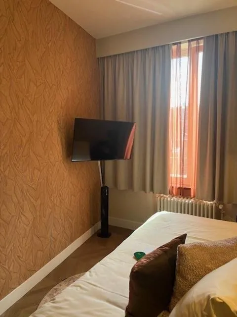 Bed in Amaryllis Hotel Veurne