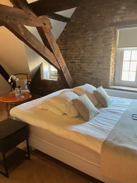 Bed in Amaryllis Hotel Veurne