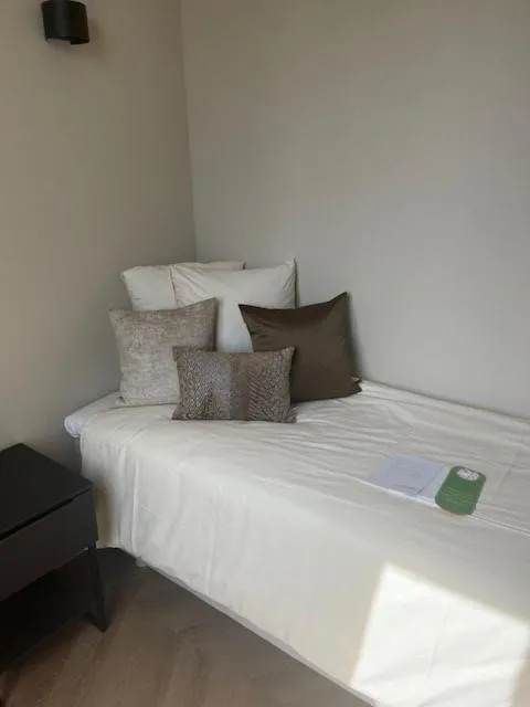 Bed in Amaryllis Hotel Veurne