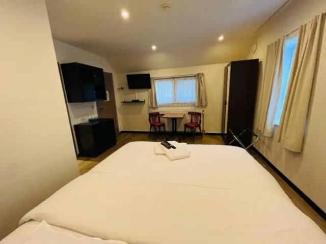 Property building, Bed in Parkhotel Gent Centrum