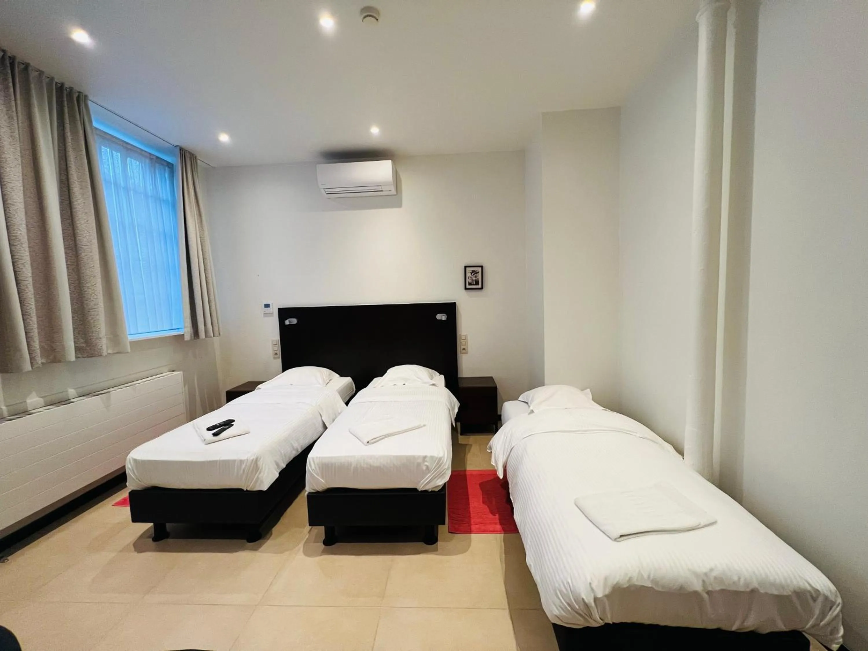 Property building, Bed in Parkhotel Gent Centrum