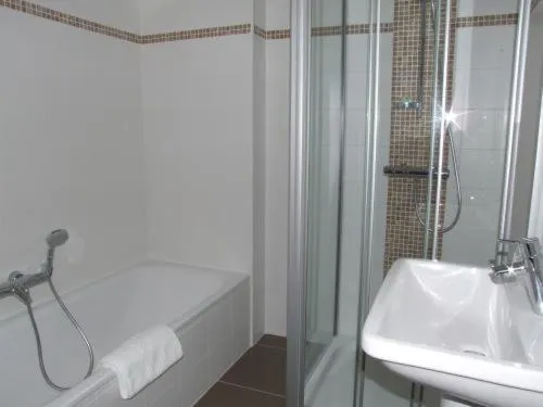 Bathroom in Well'in Hotel