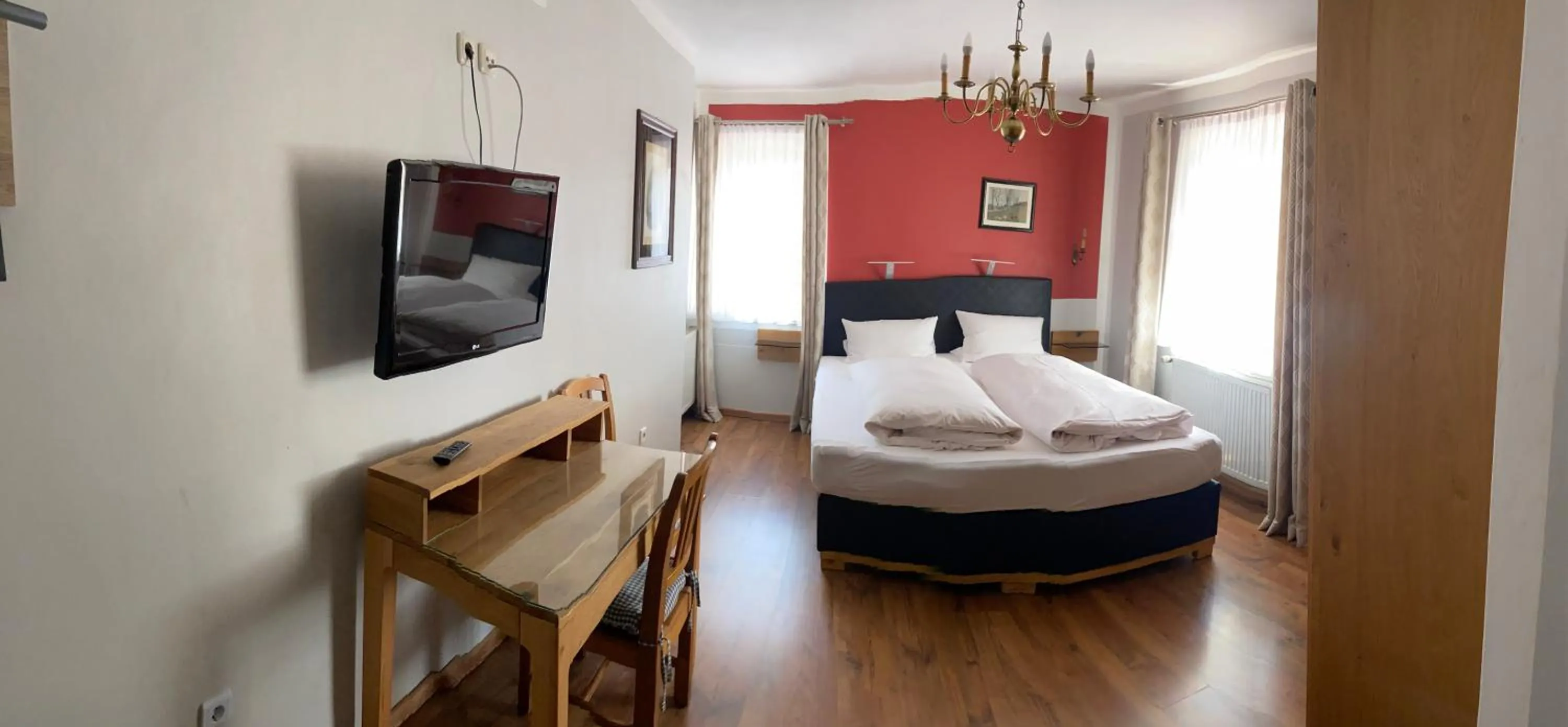 Photo of the whole room, Bed in Landhotel Kahrmühle