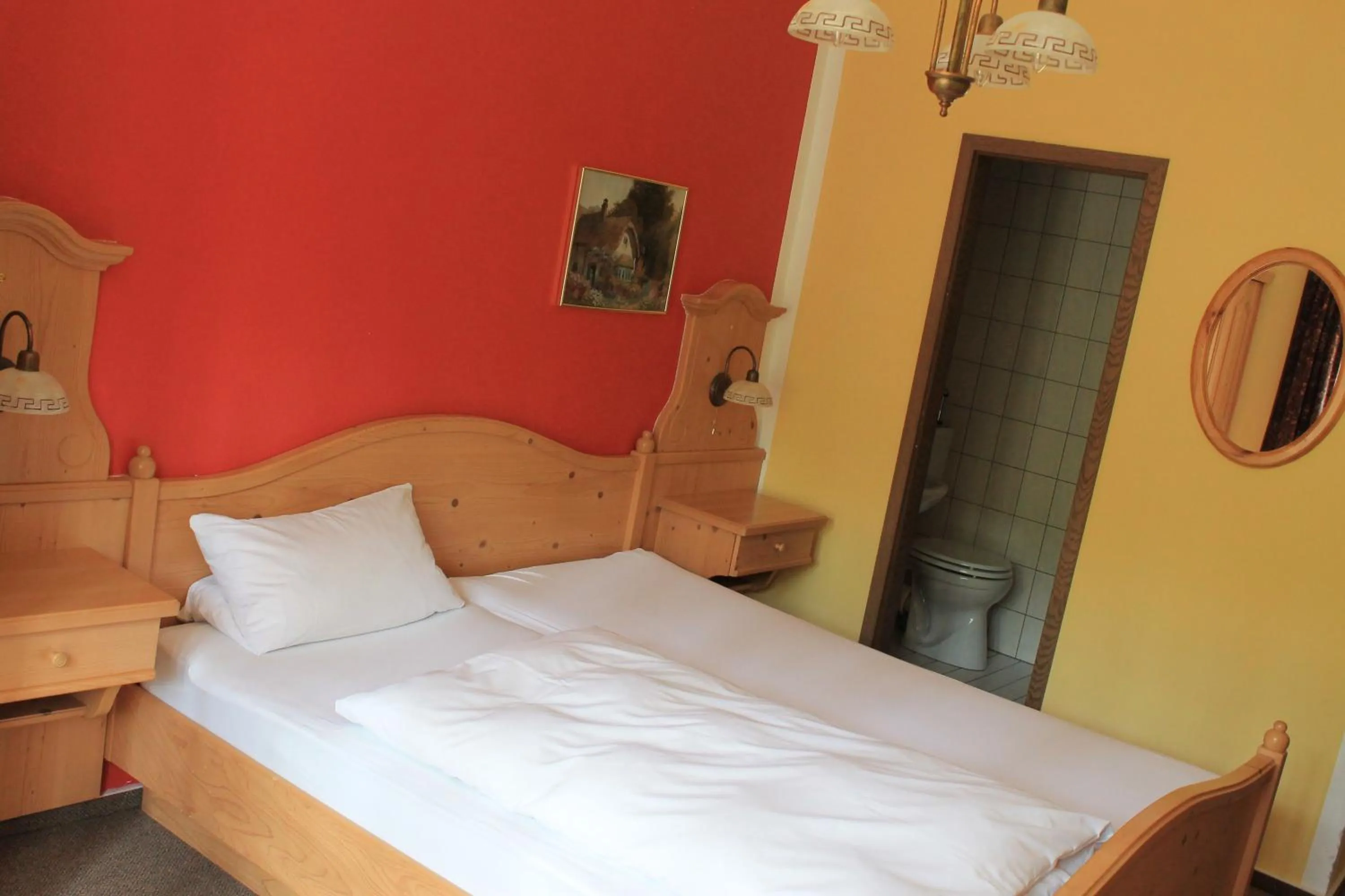 Photo of the whole room, Bed in Landhotel Kahrmühle