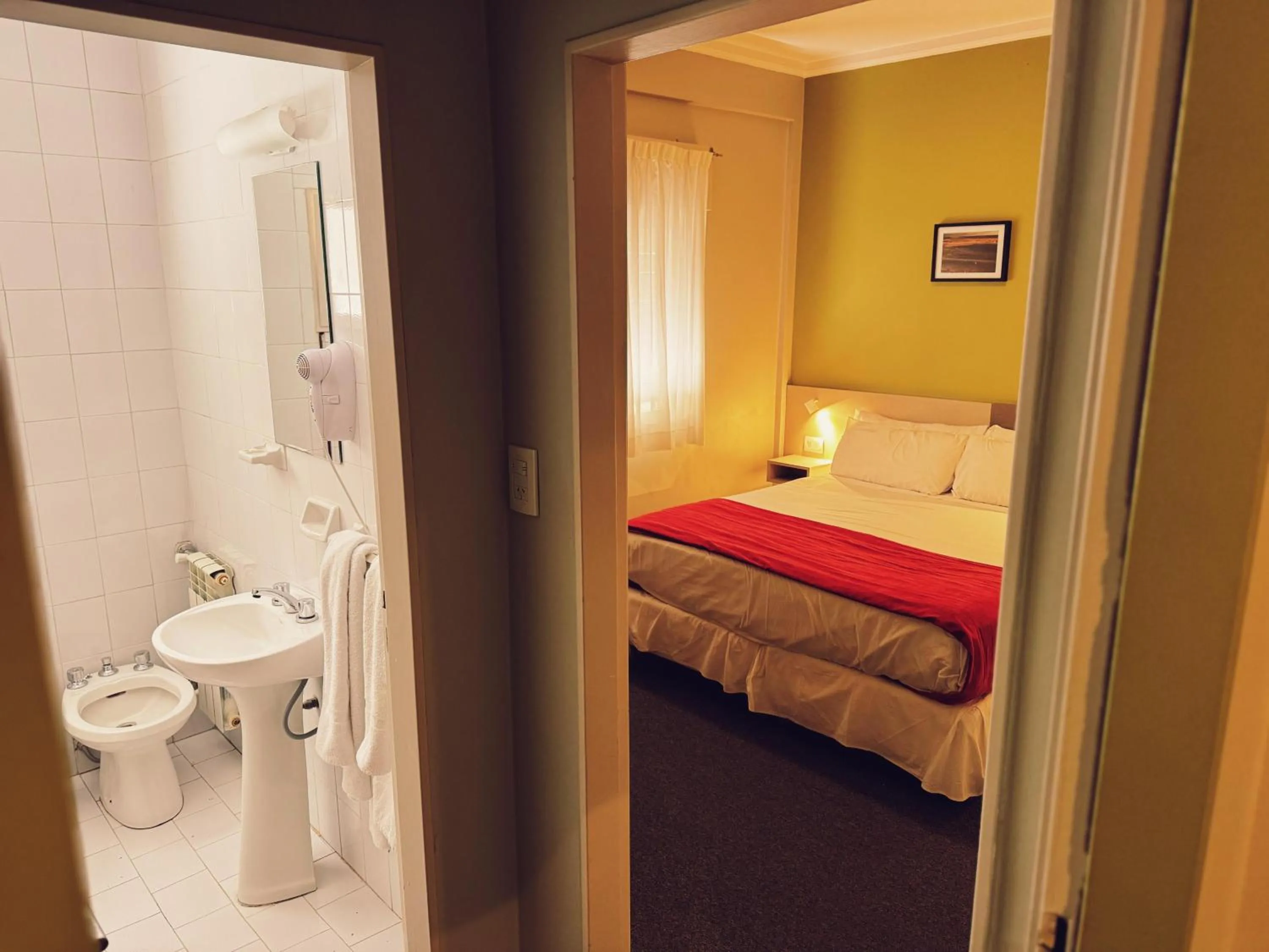 Toilet, Bed in Estepa Hotel