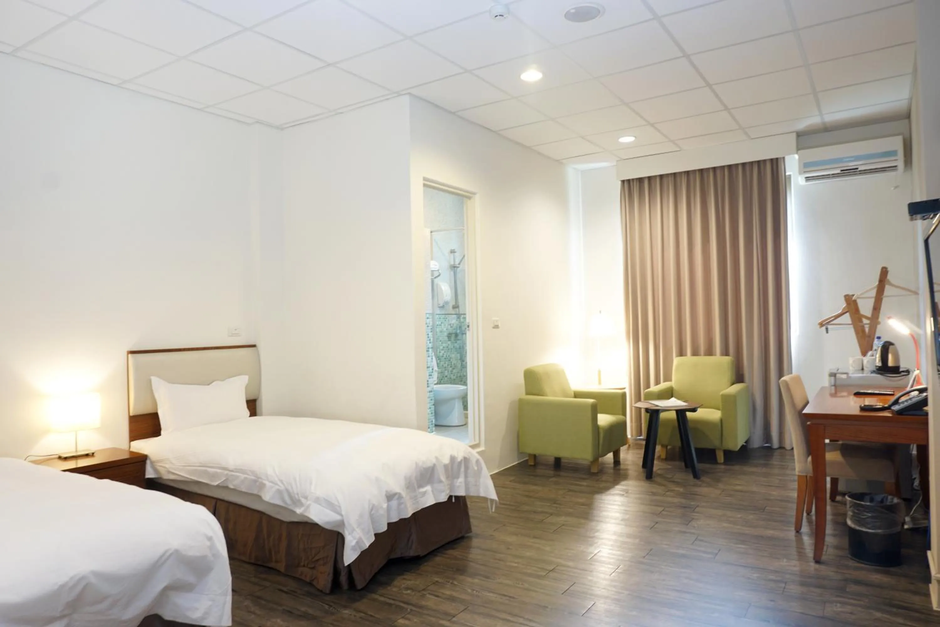 Bed in NCNU Campus Inn暨大行旅