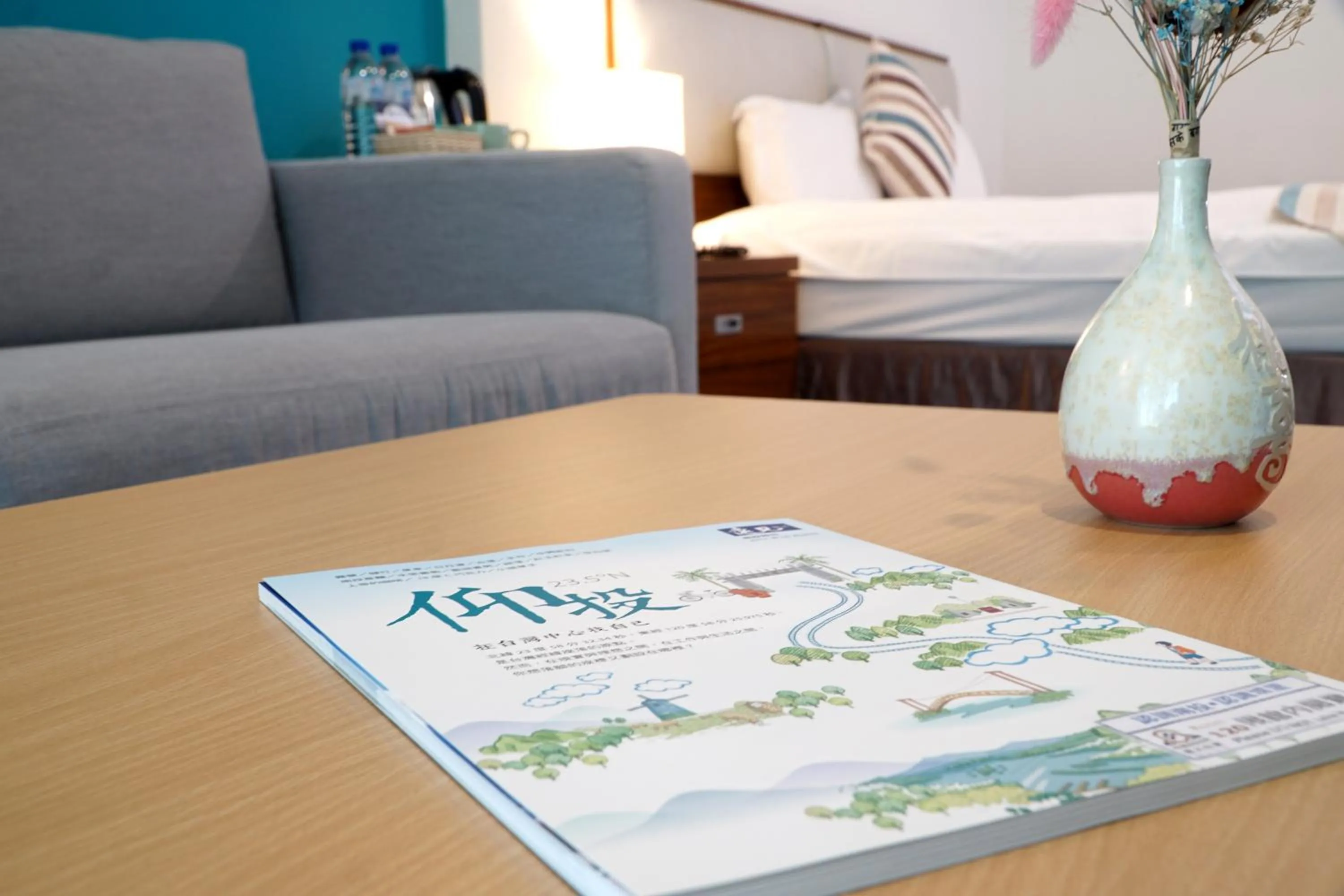 Seating area, Bed in NCNU Campus Inn暨大行旅