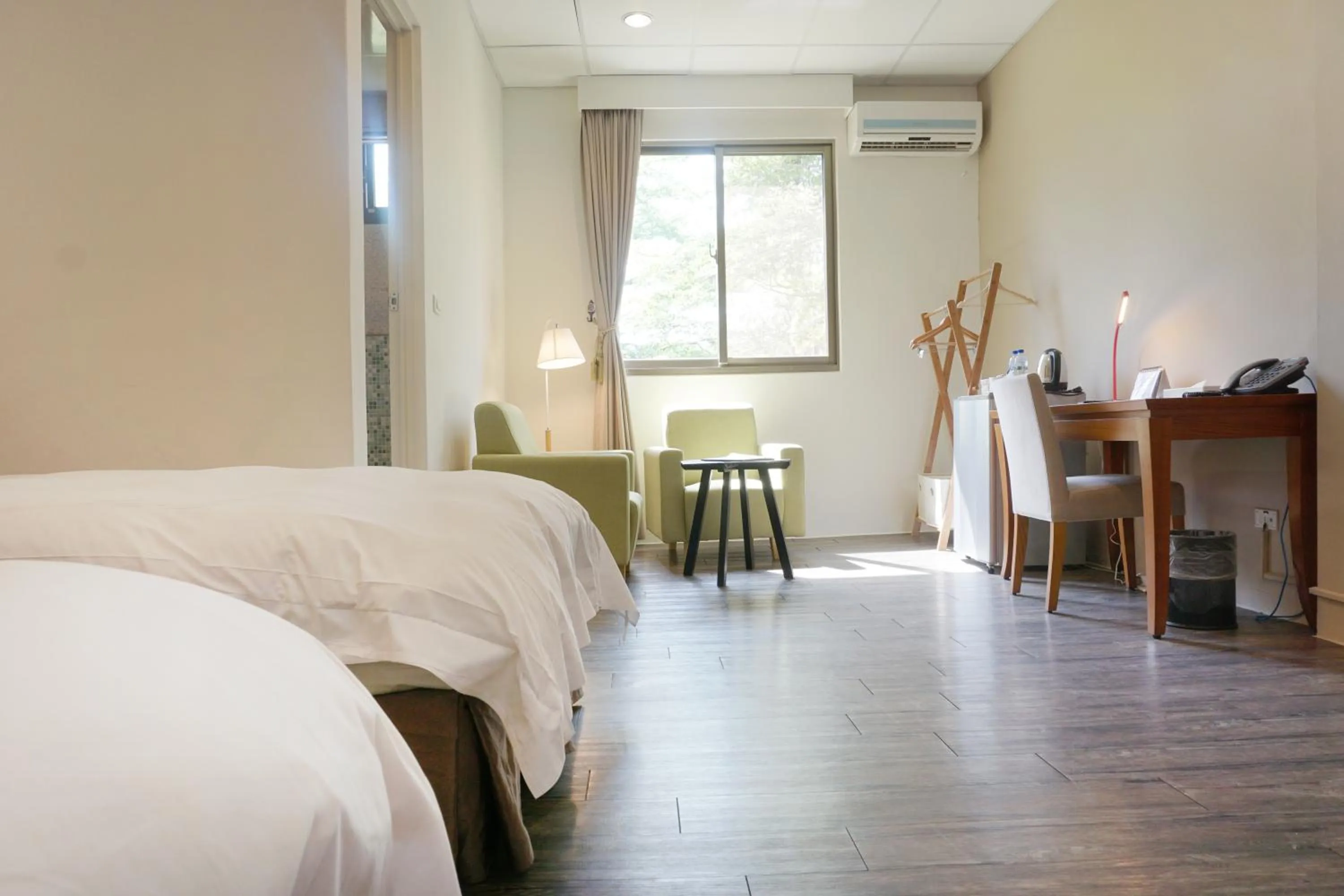 Bed in NCNU Campus Inn暨大行旅