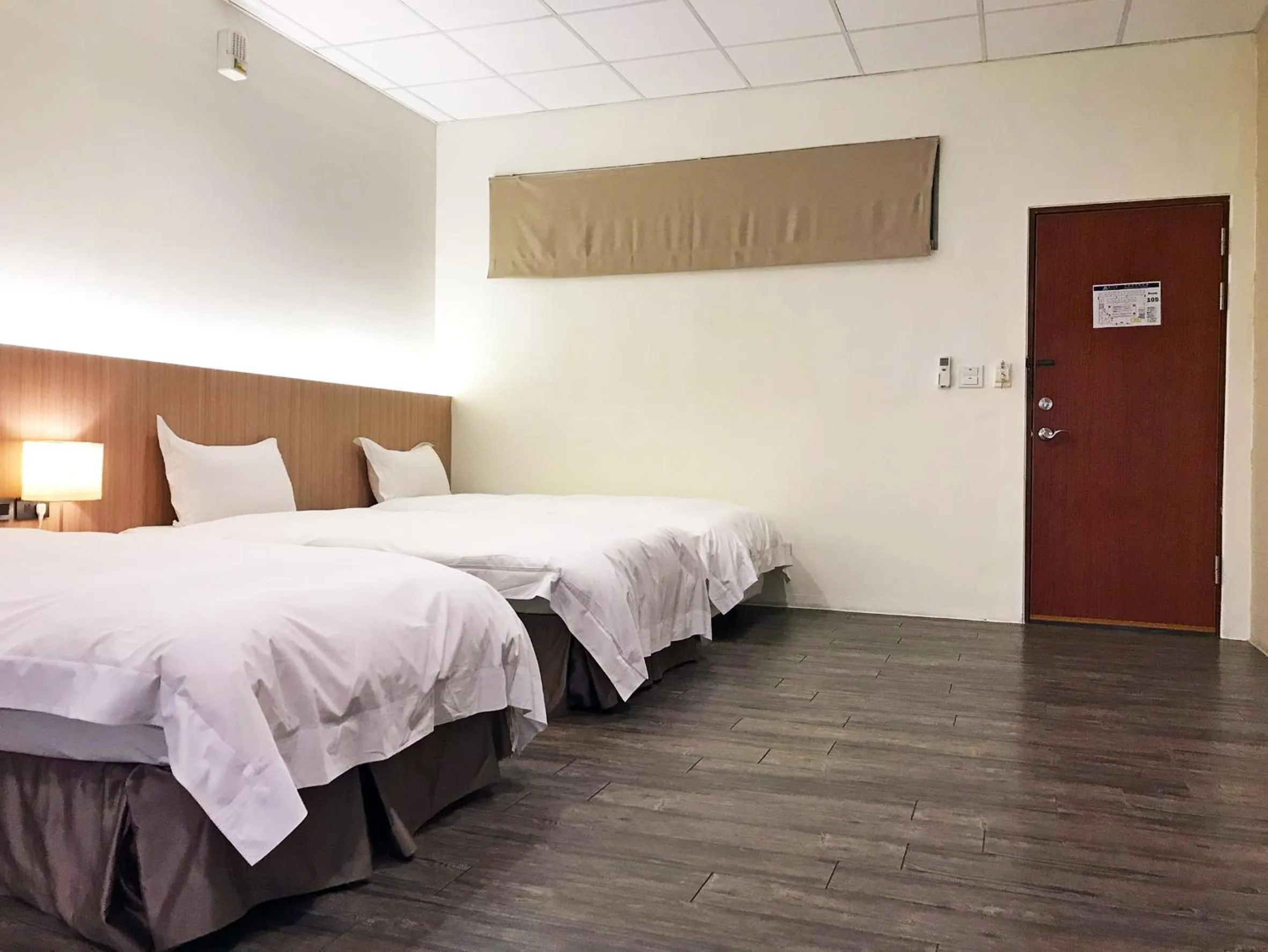 Bed in NCNU Campus Inn暨大行旅