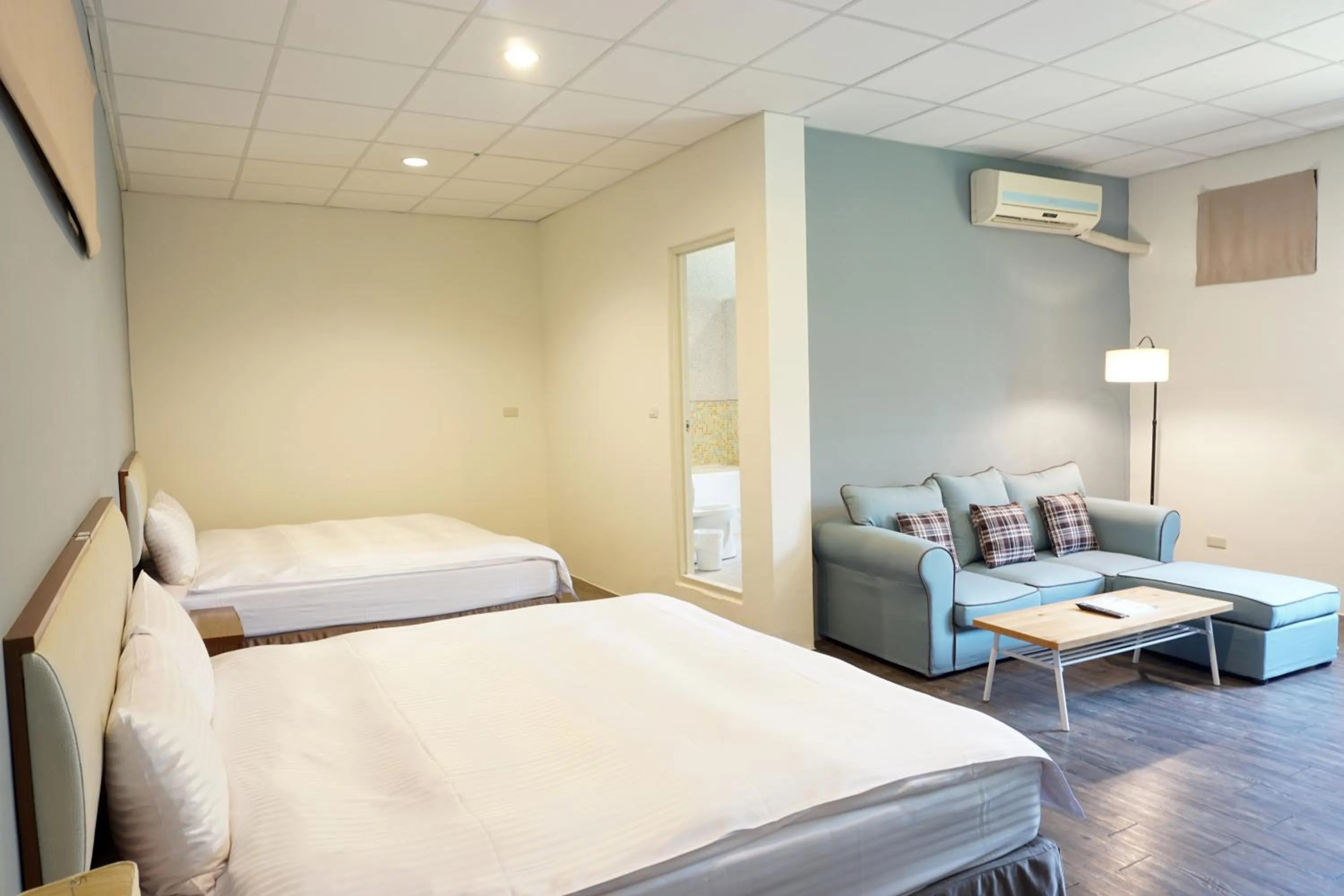 Photo of the whole room, Bed in NCNU Campus Inn暨大行旅