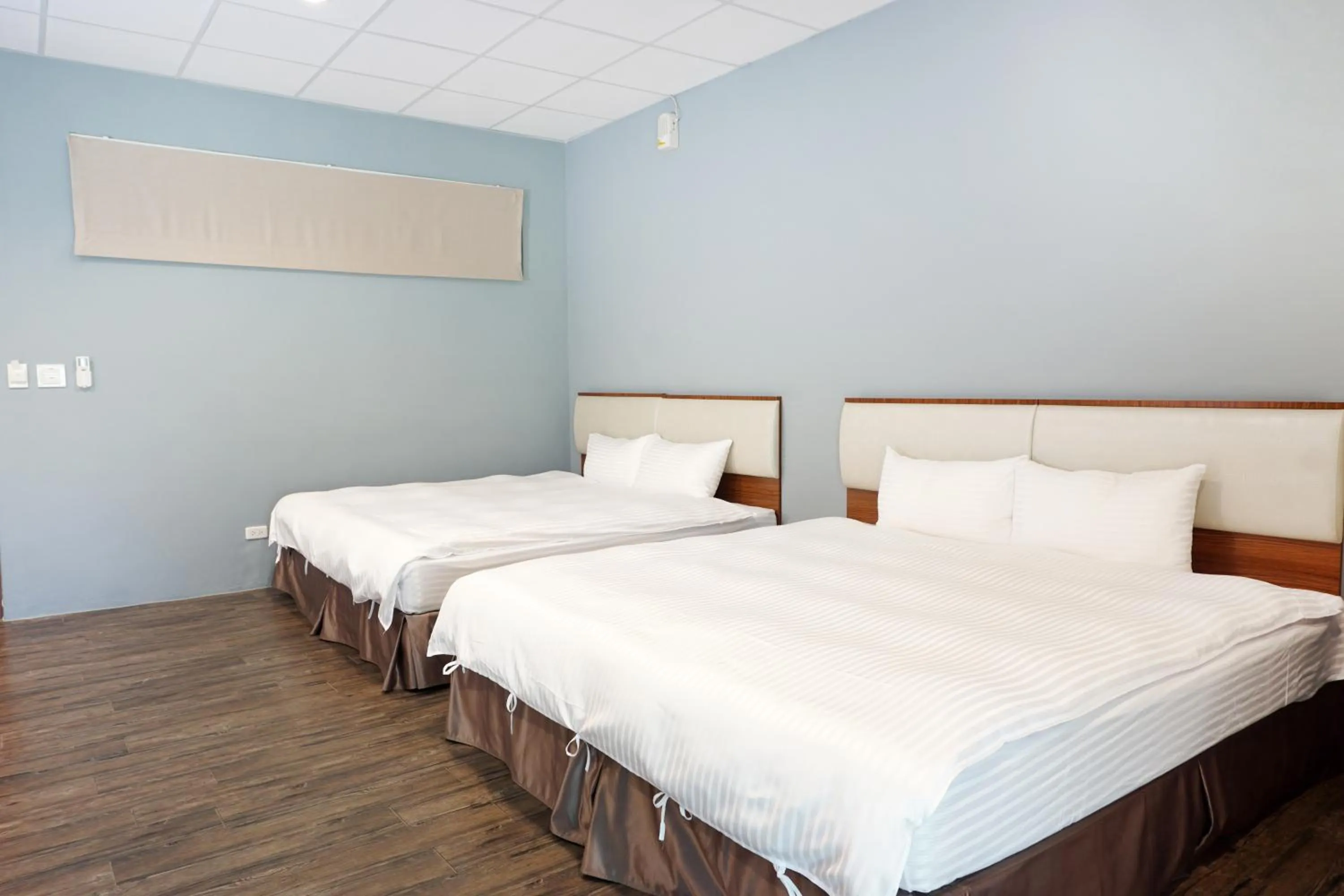 Bed in NCNU Campus Inn暨大行旅