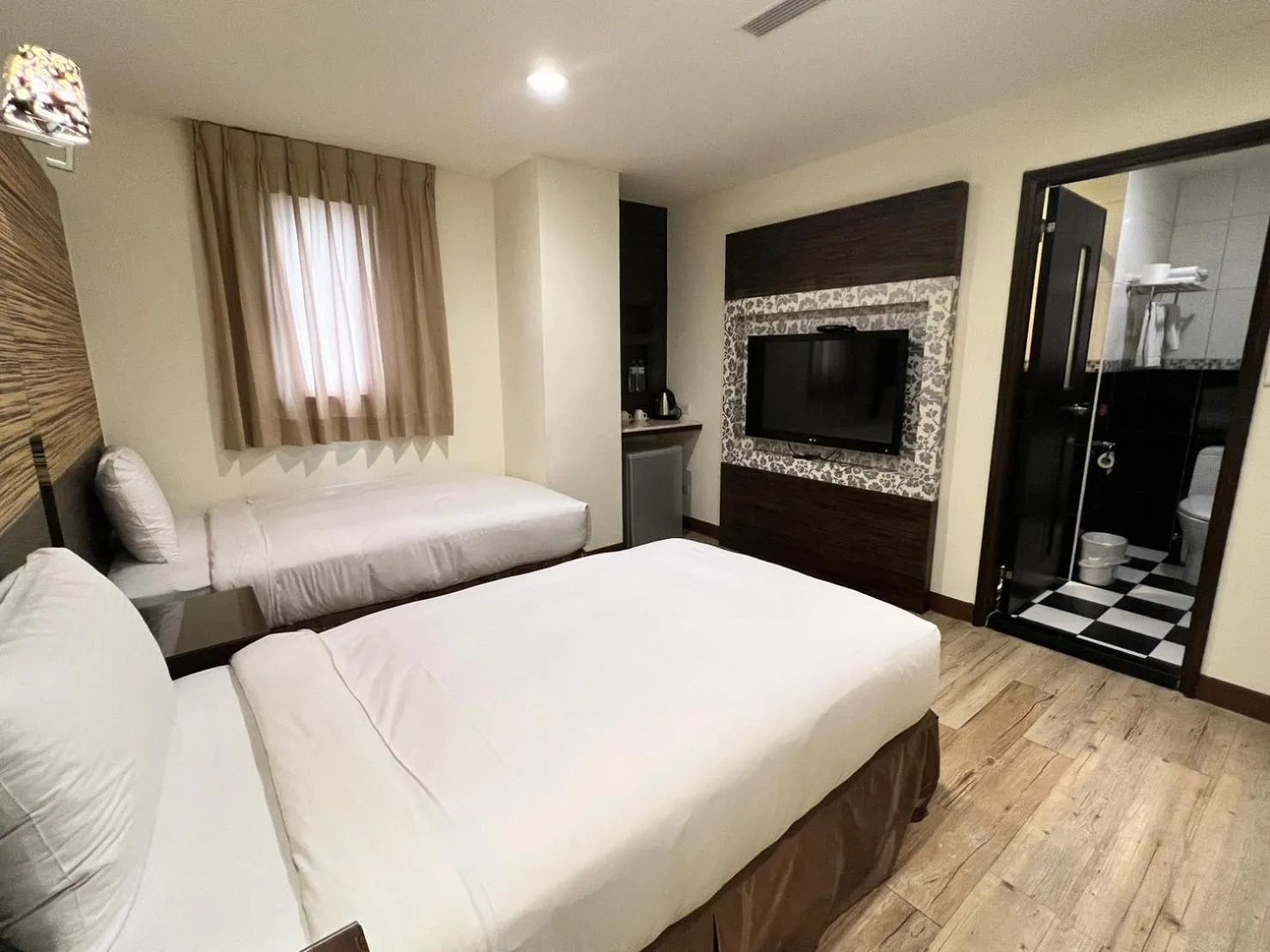 Bed in Kaishen Hotel