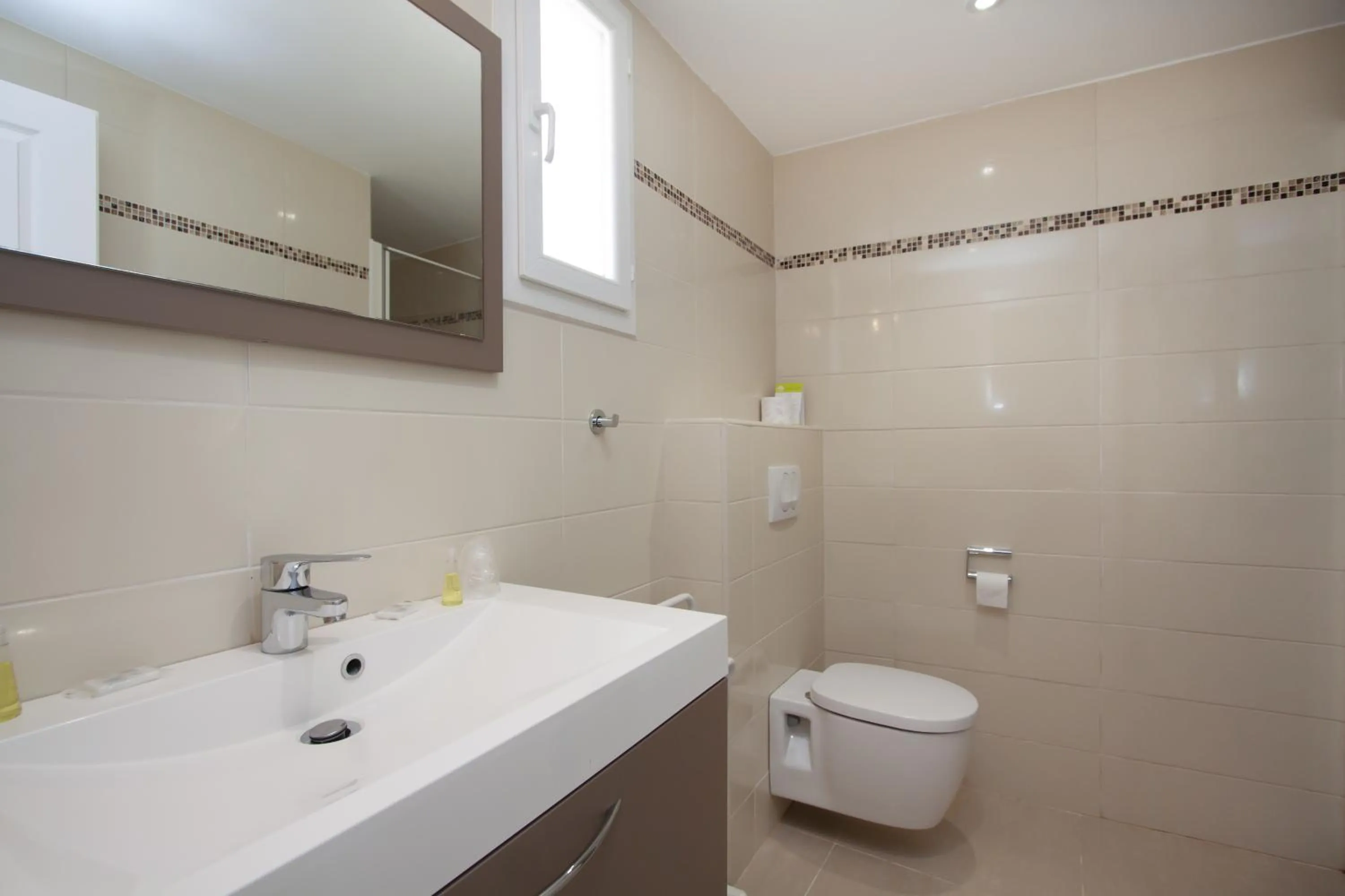 Bathroom in Hôtel et Résidence Ta Kladia - Omigna