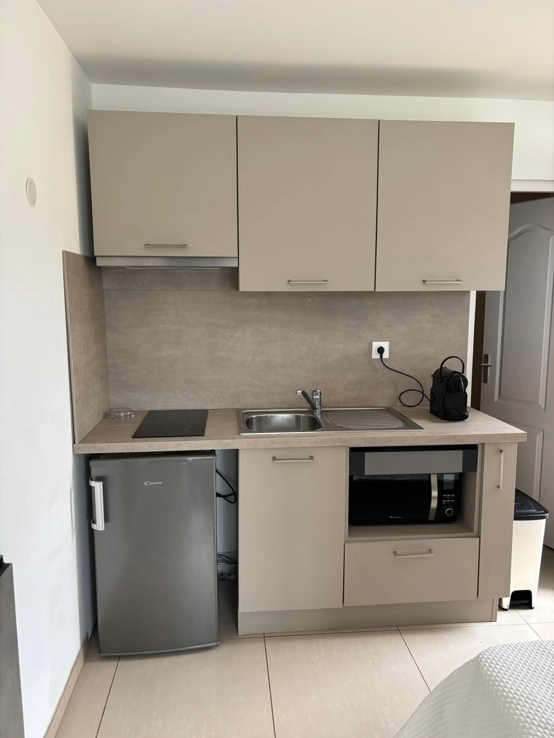 kitchen in Hôtel et Résidence Ta Kladia - Omigna