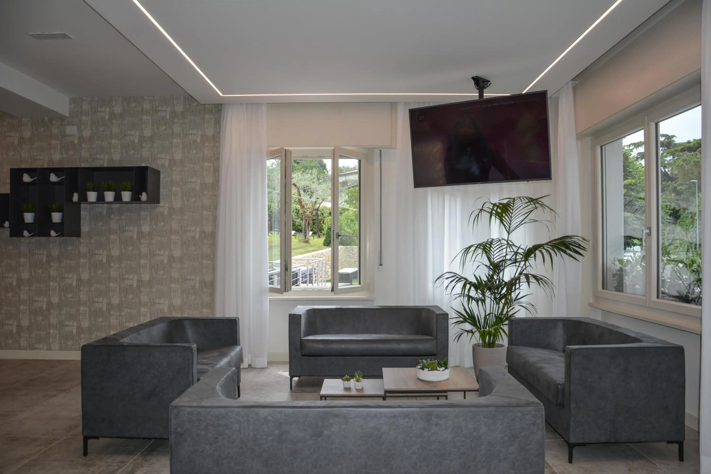 Communal lounge/ TV room in Hotel Stella Alpina