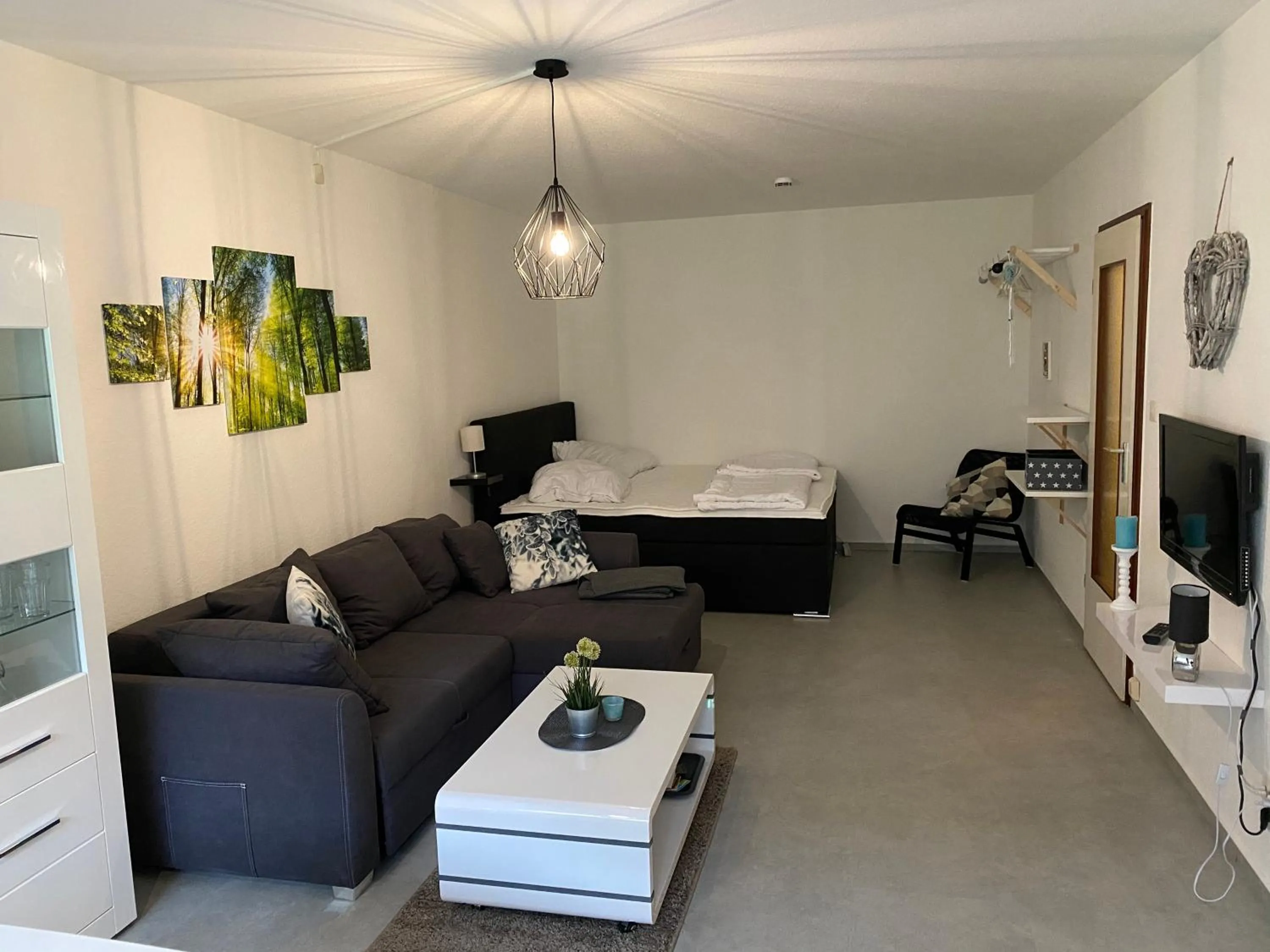 Living room, Bed in Ferienwohnung Schneewittchen