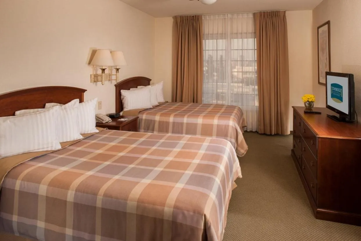 Photo of the whole room, Bed in Staybridge Suites Monterrey San Pedro by IHG