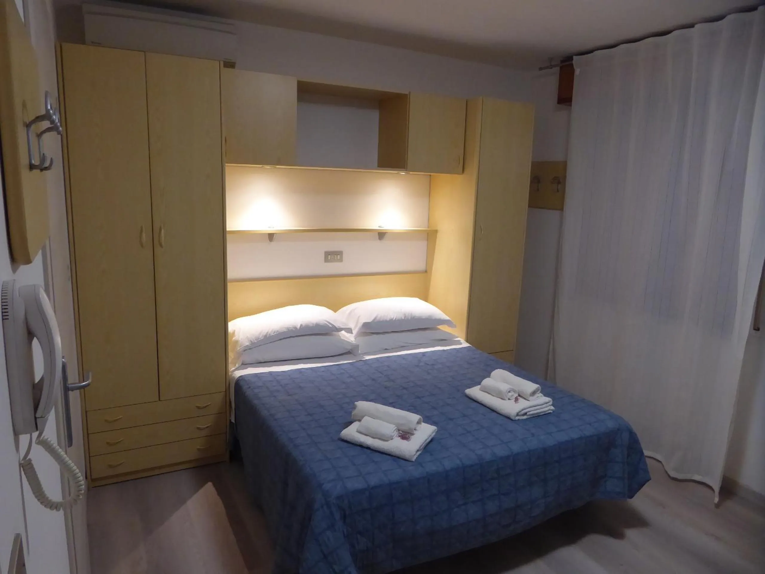 Bed in Albergo Vittoria