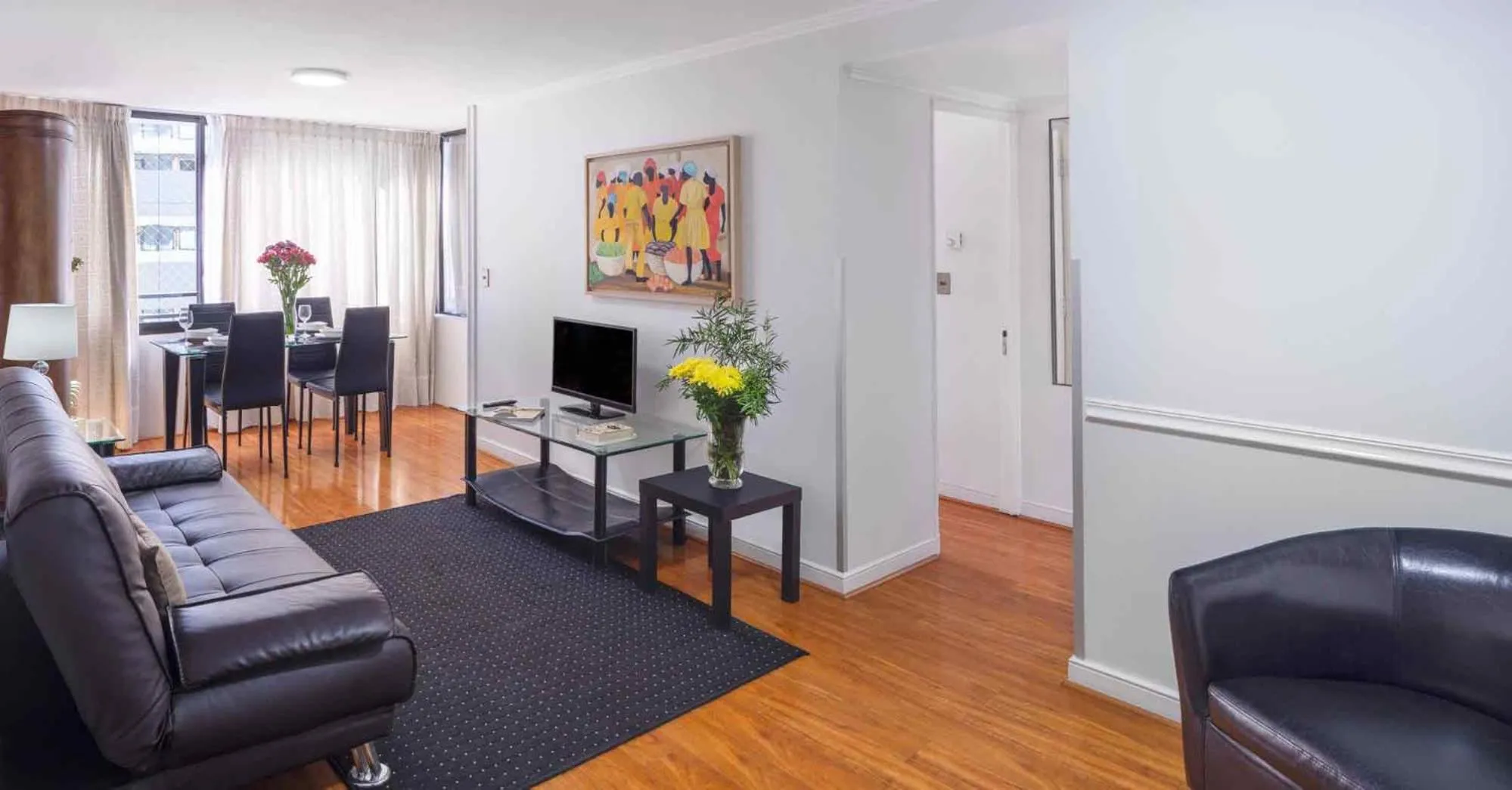 Communal lounge/ TV room in Santa Magdalena Apartments