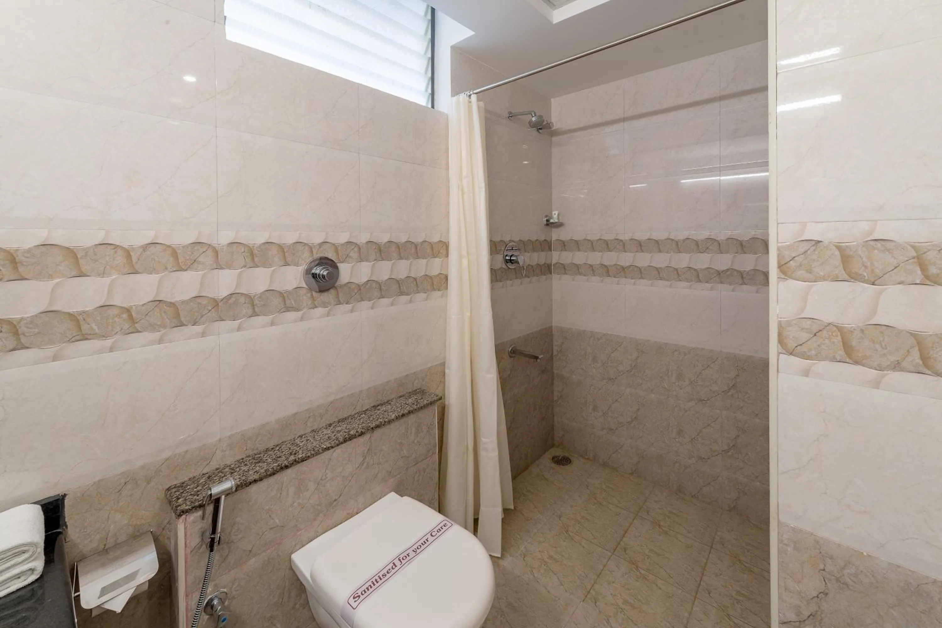 Bathroom in Treebo Raj Premier, Indiranagar