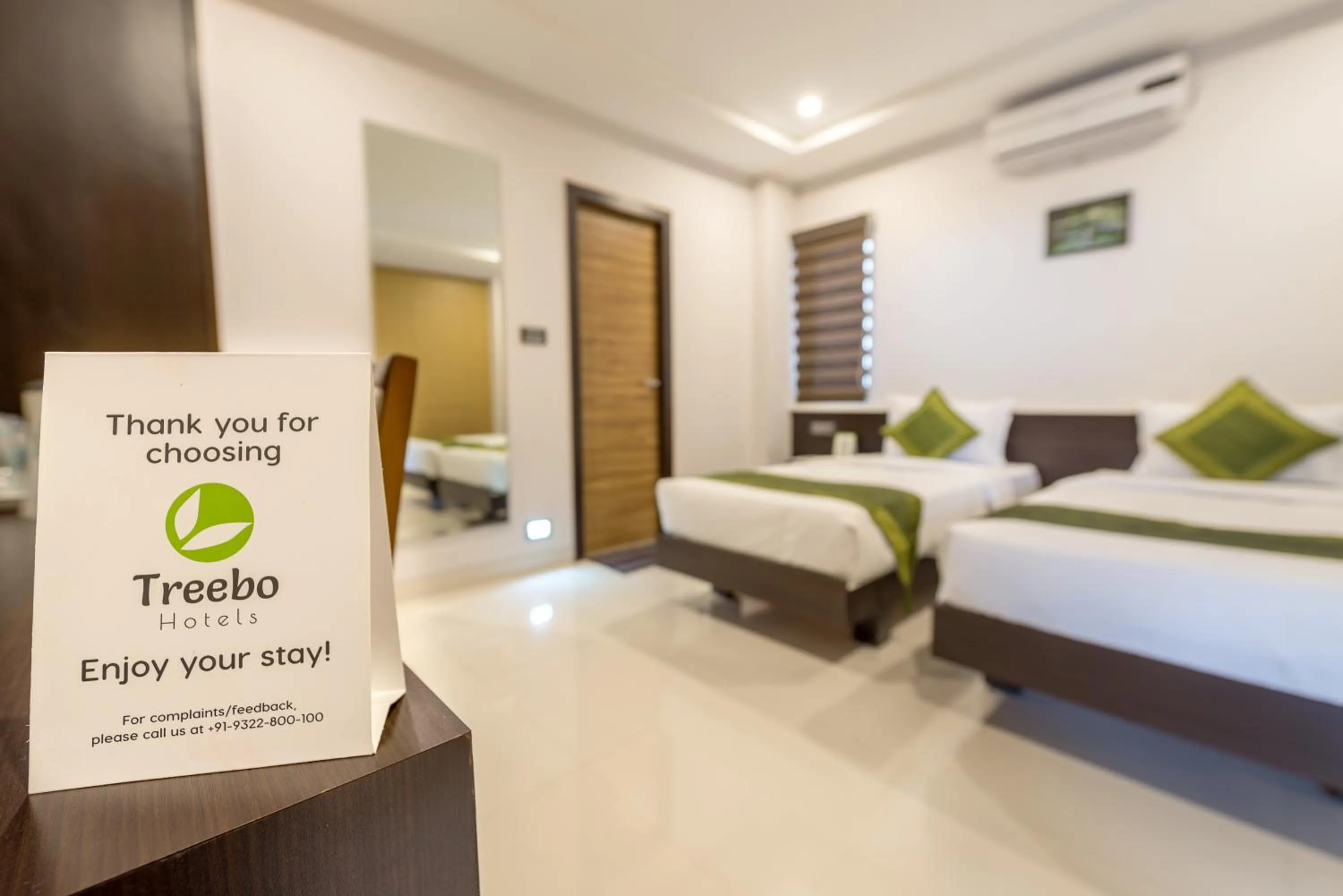 Bedroom, Bed in Treebo Raj Premier, Indiranagar