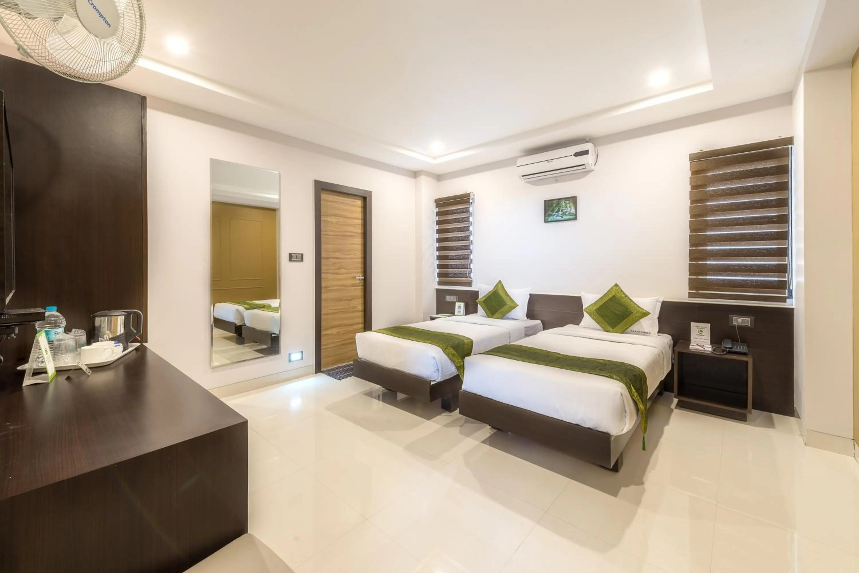 Bedroom, Bed in Treebo Raj Premier, Indiranagar