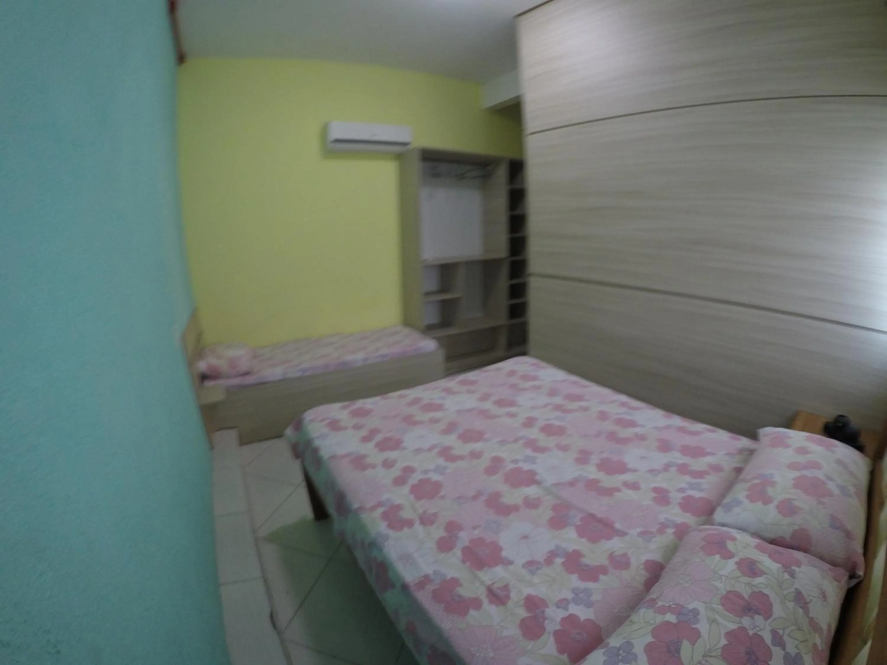 Bed in Pousada Oliveira