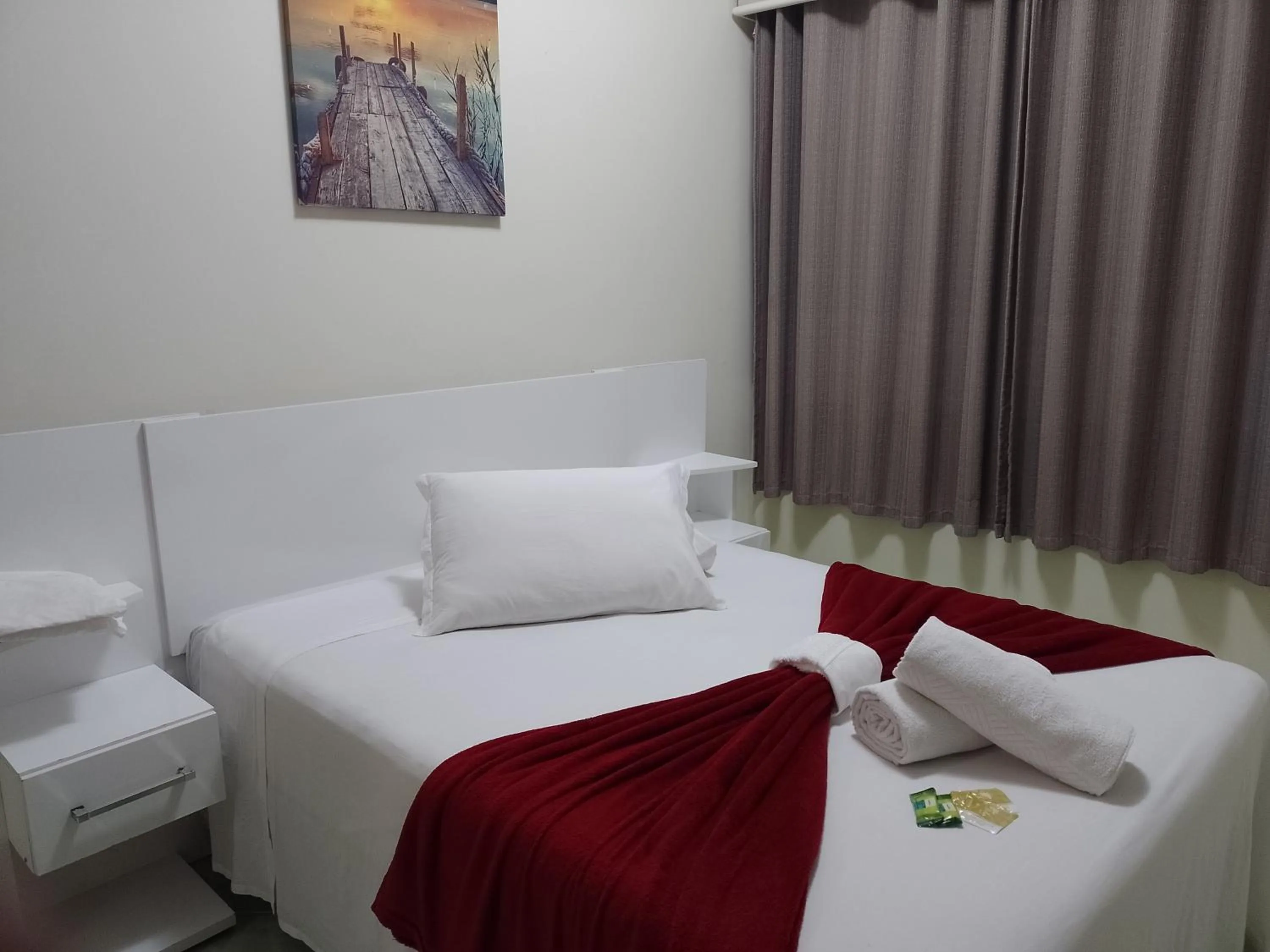 Bed in Pousada Oliveira