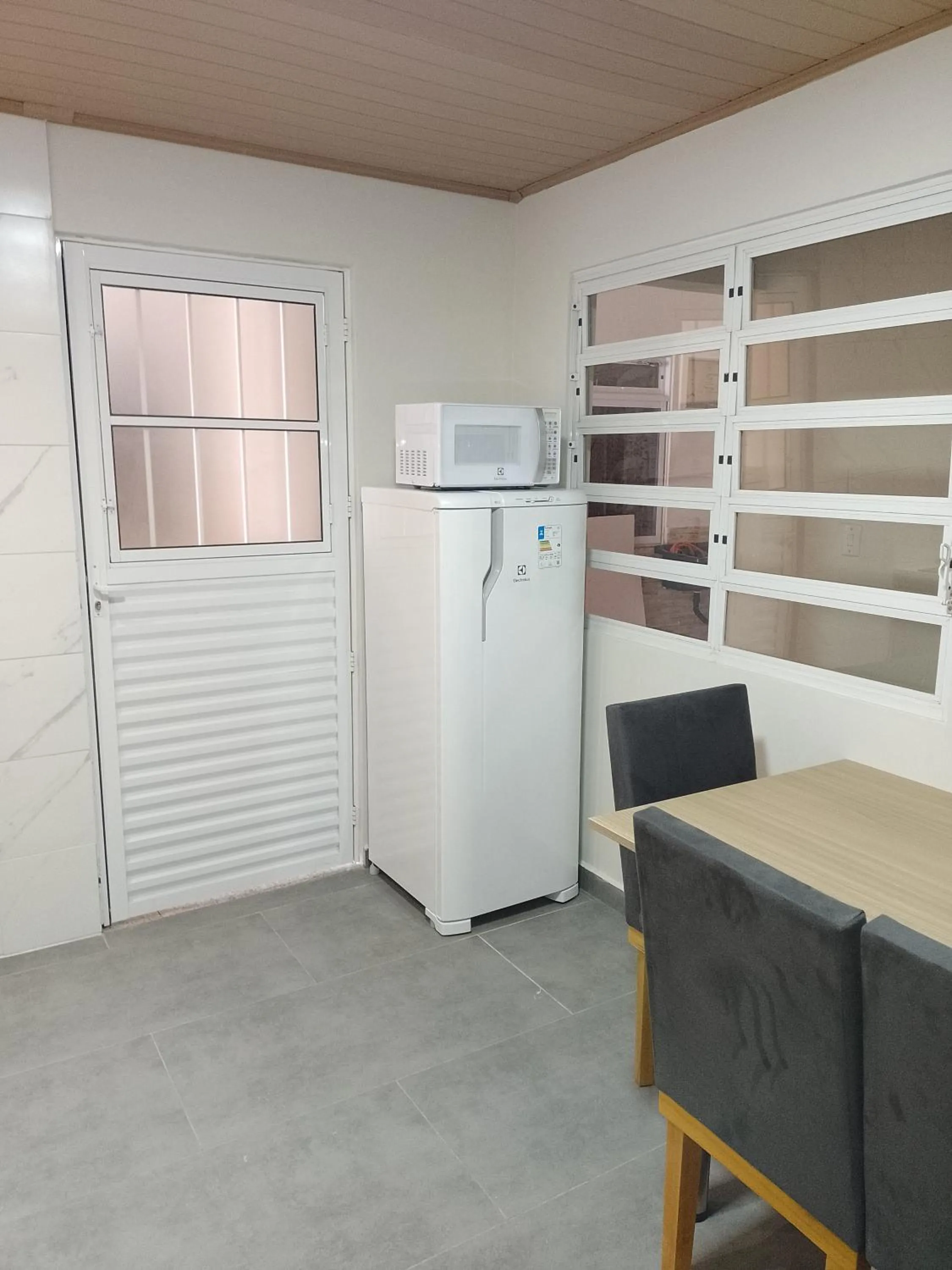 Kitchen or kitchenette in Pousada Oliveira