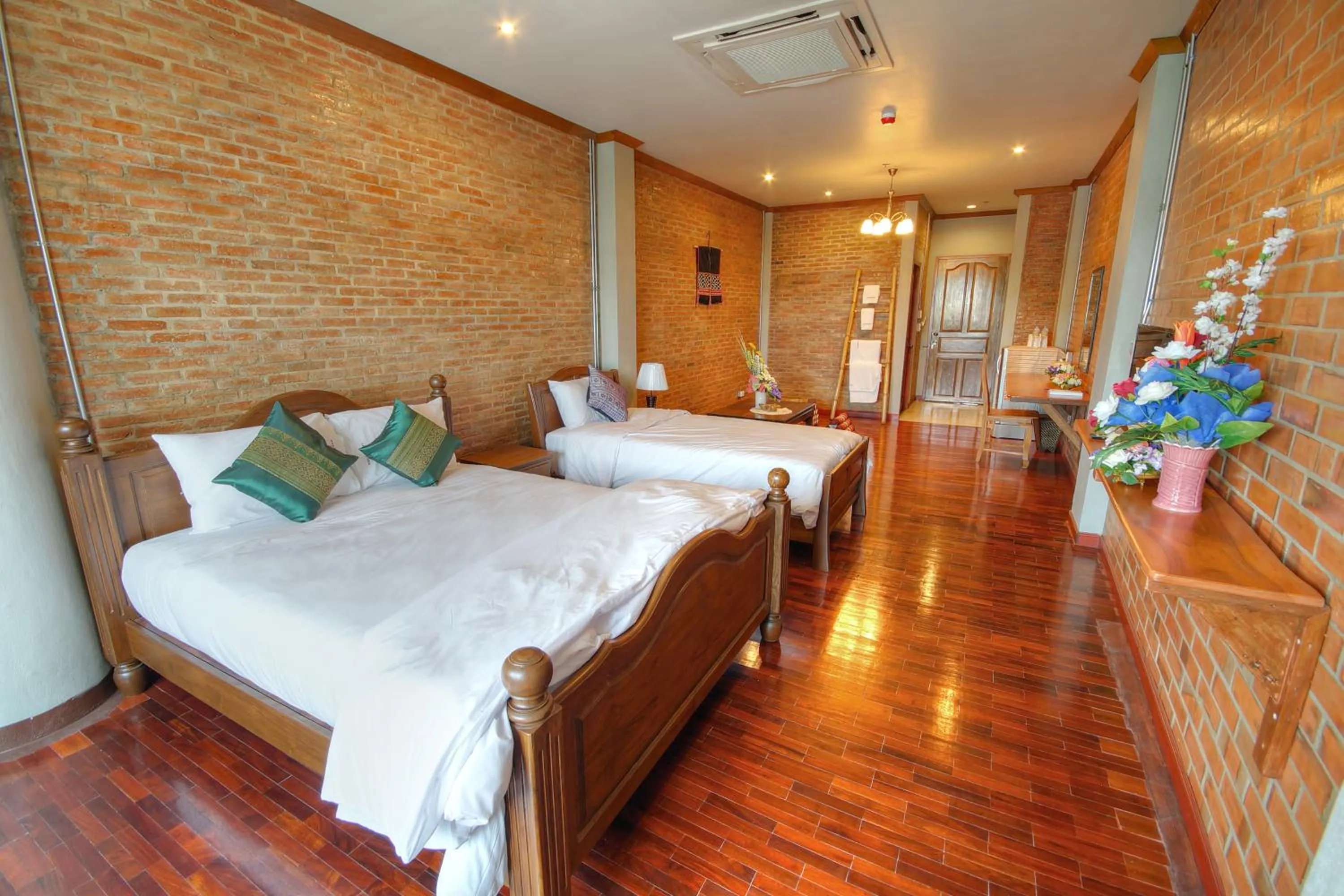 Photo of the whole room, Bed in Saeng Panya Home SHA Plus