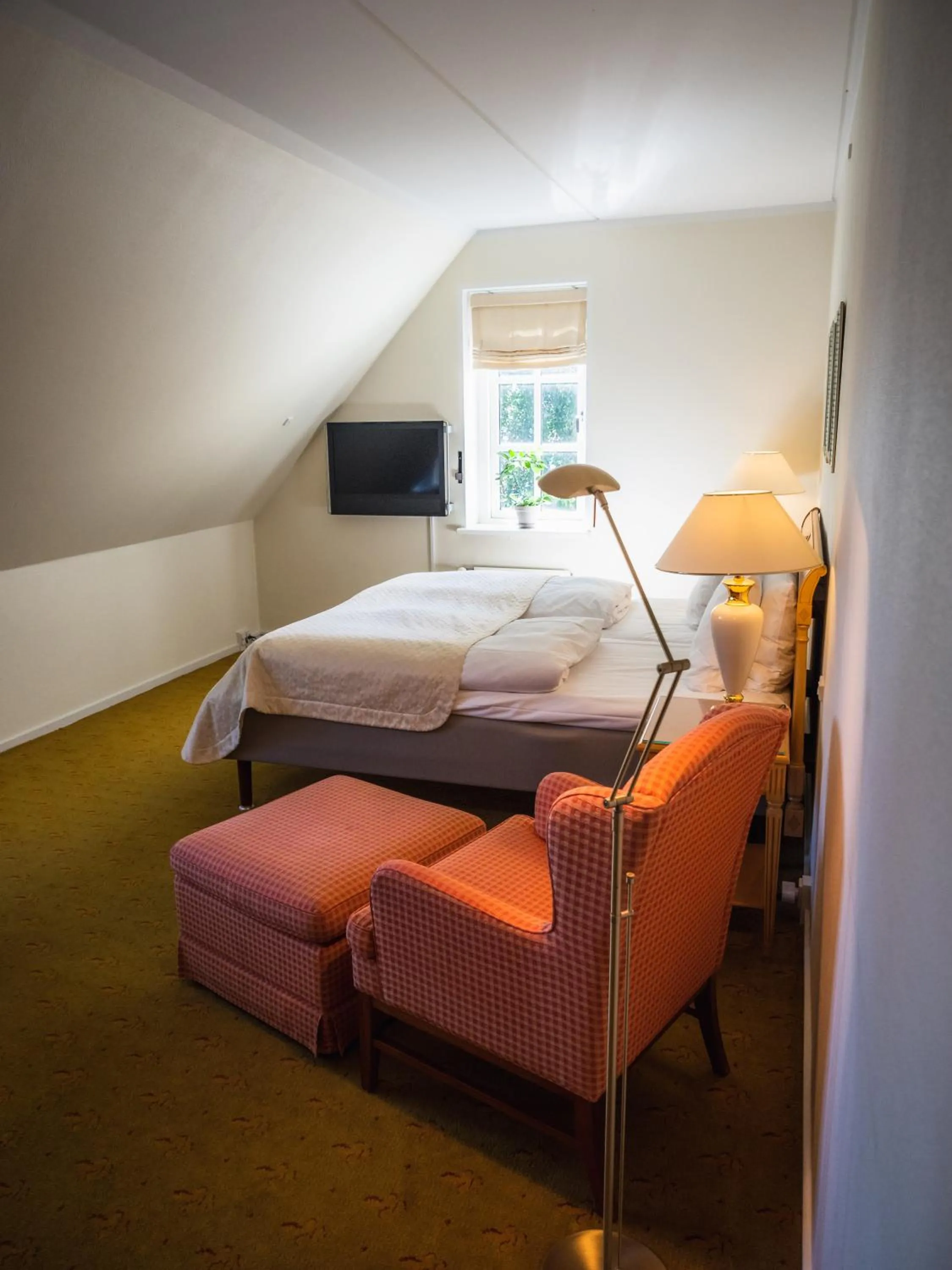 Bedroom, Bed in Hotel Knudsens Gaard