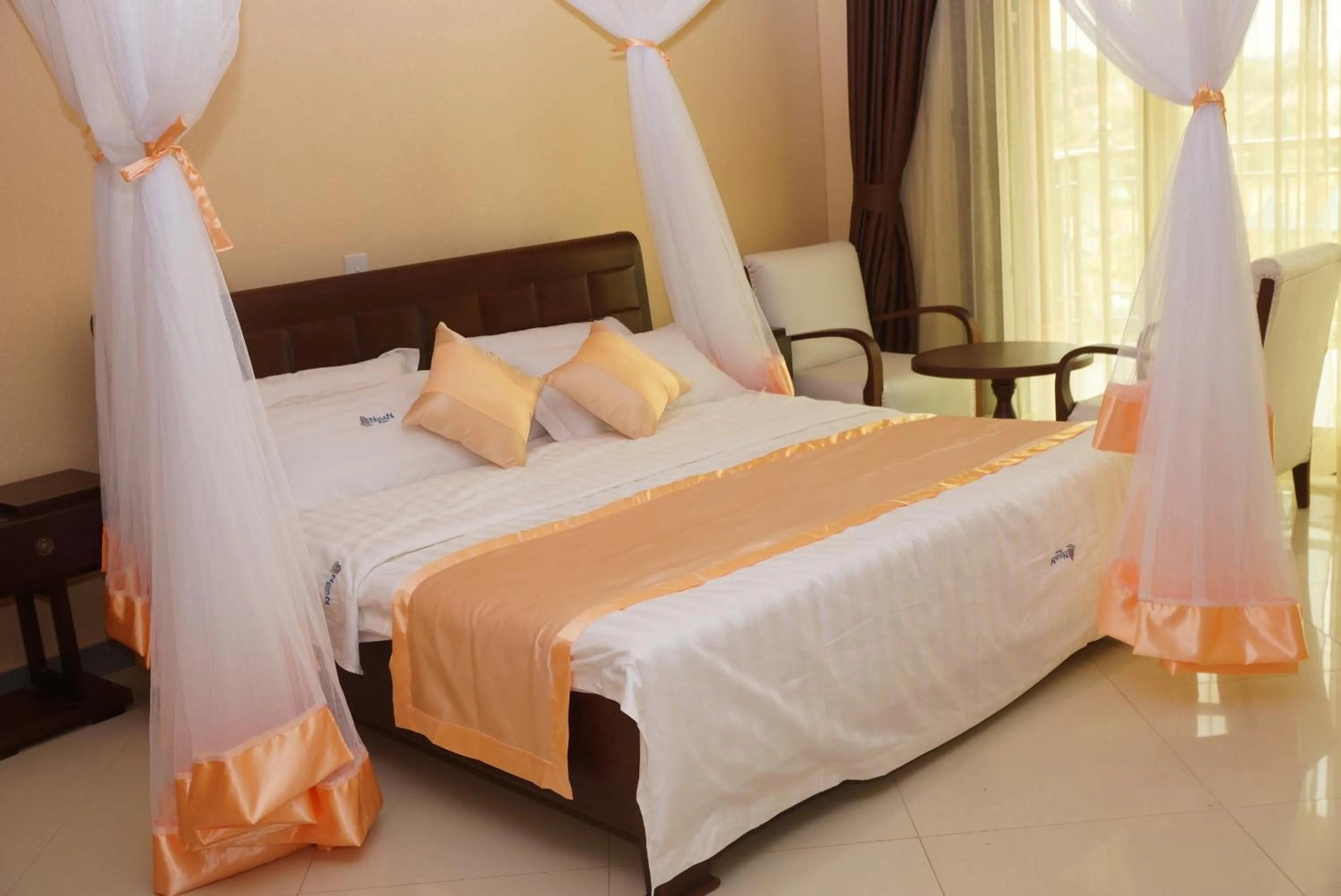 Bed in Nican Resort Hotel Seguku Entebbe