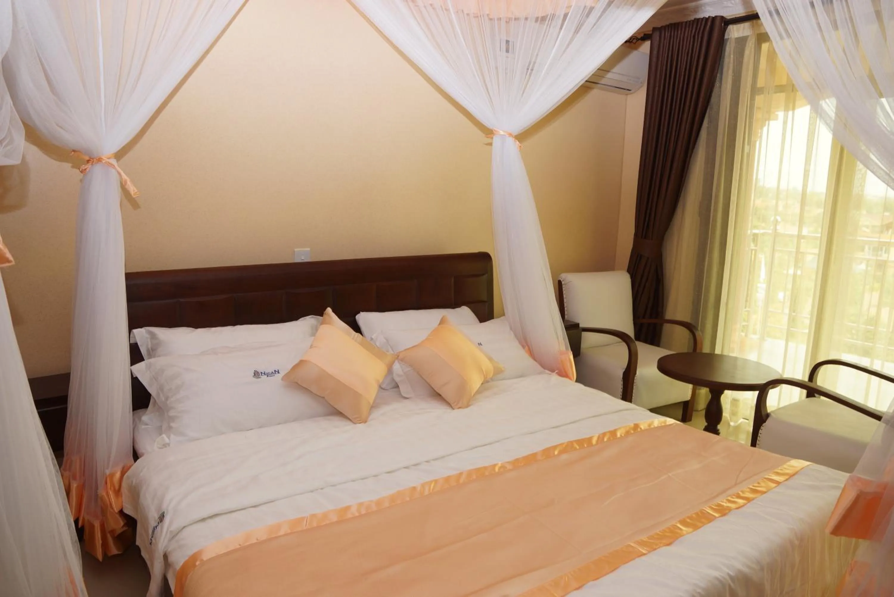 Bed in Nican Resort Hotel Seguku Entebbe
