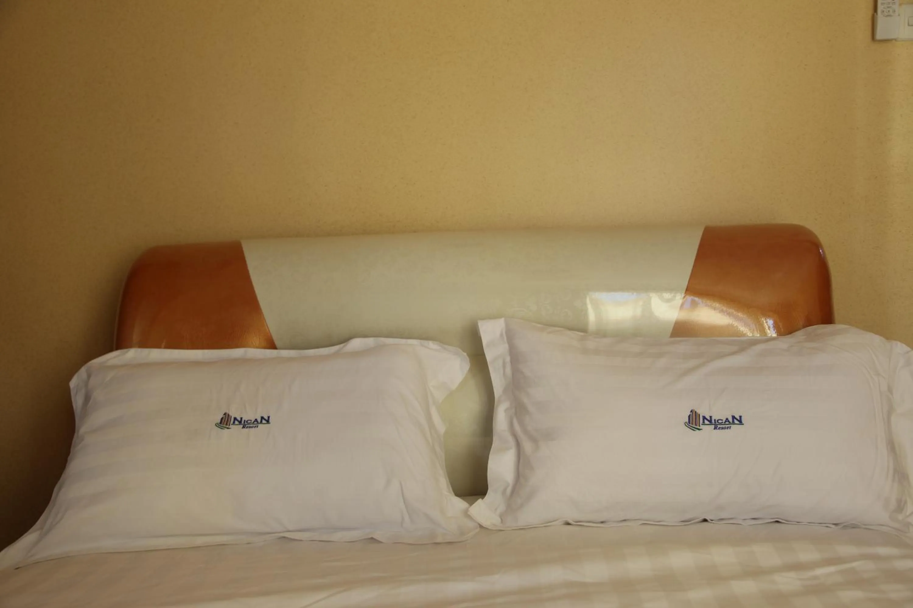 Bed in Nican Resort Hotel Seguku Entebbe